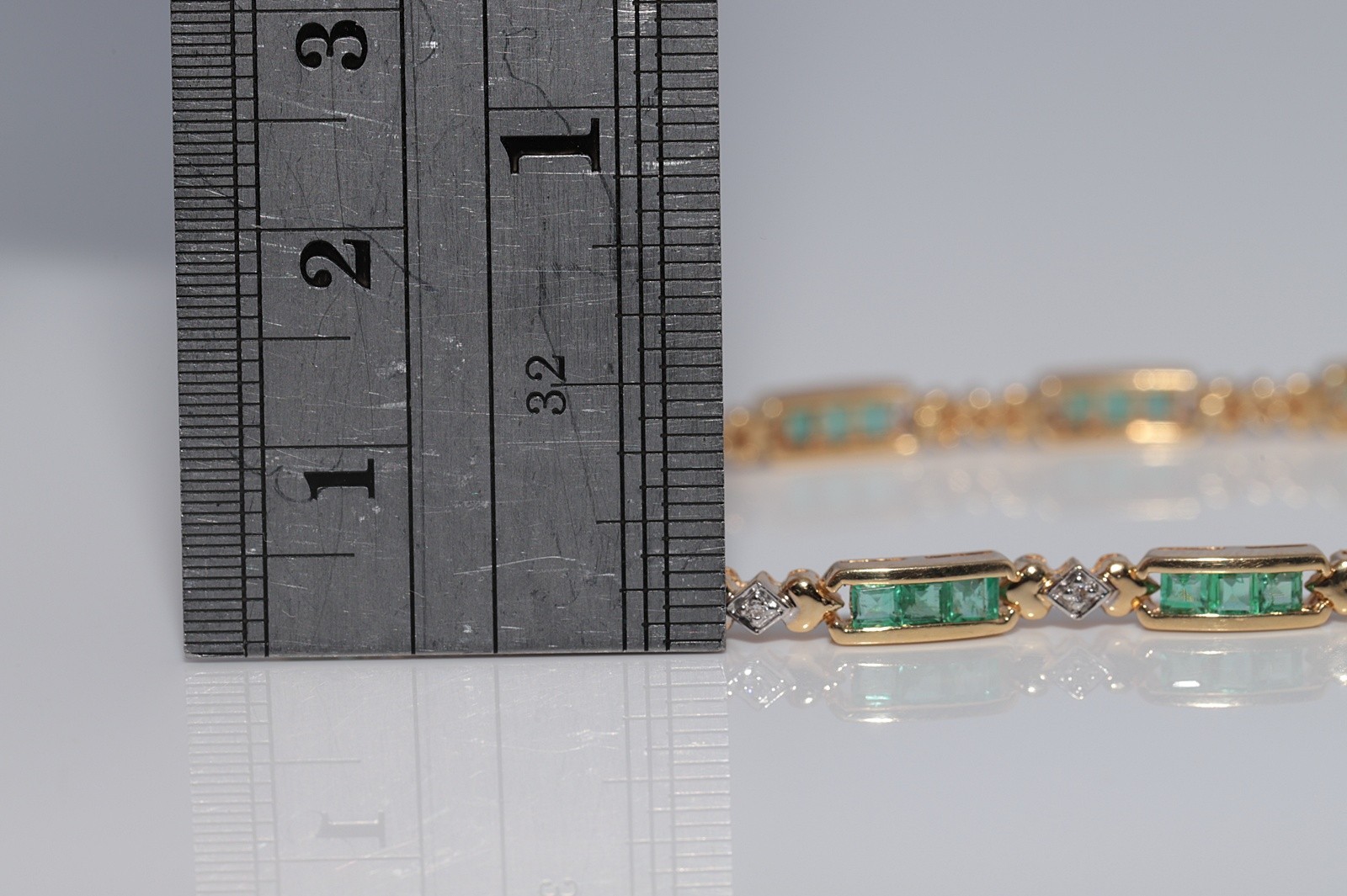 Vintage Circa 1980s 18k Gold Natural Diamond And Caliber Cut Emerald Bracelet