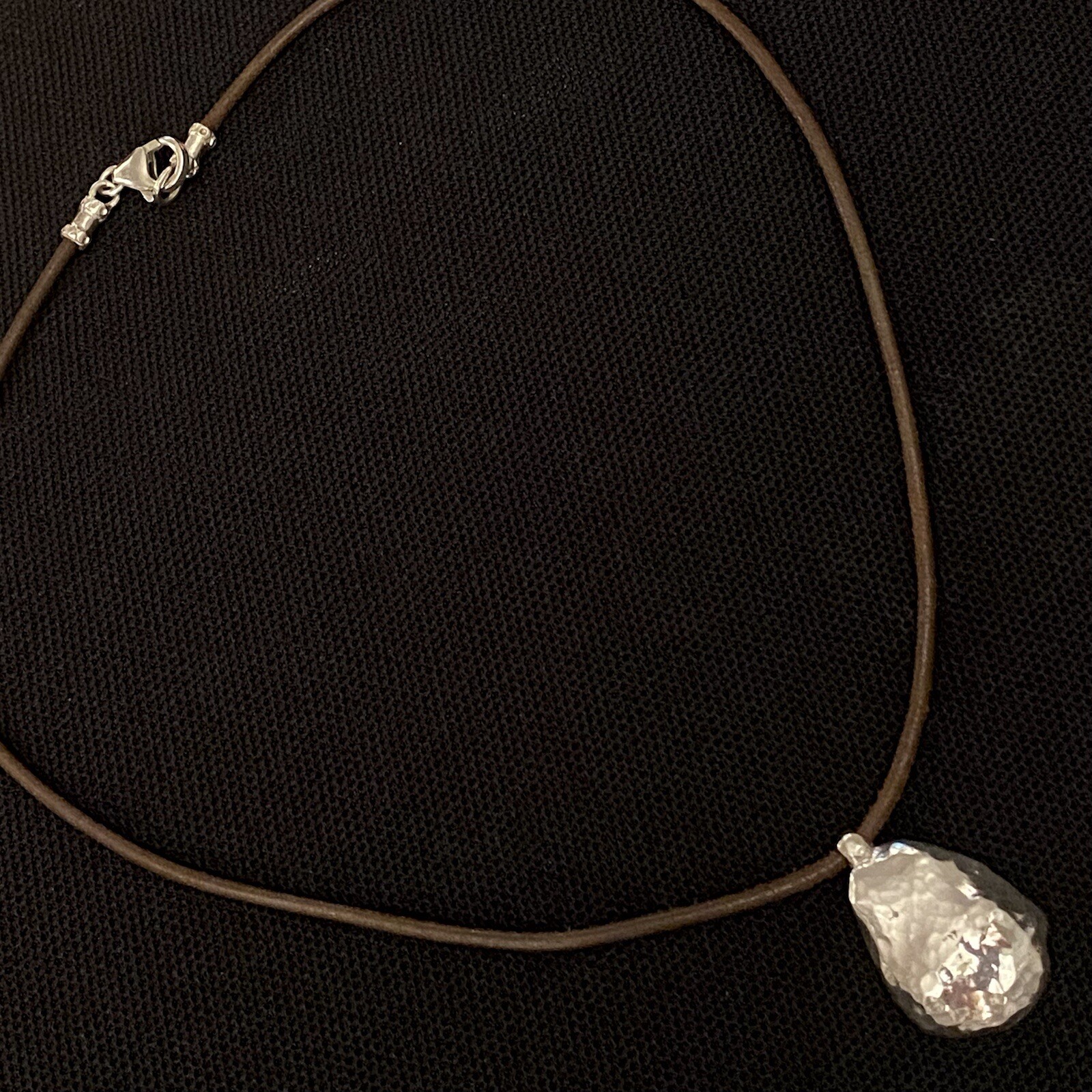 NICE ESTATE STERLING SILVER NUGGET STYLE PENDANT ON LEATHER CORD NECKLACE 16”