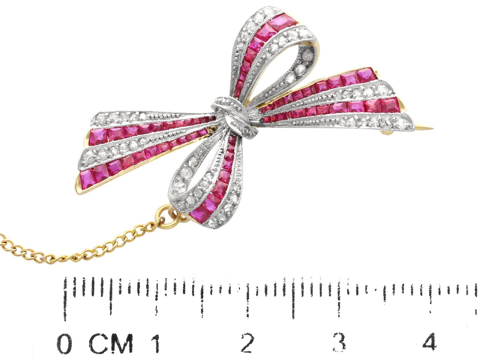 Antique 0.78Ct Ruby and 0.40Ct Diamond 18k Yellow Gold Bow Brooch Circa 1910