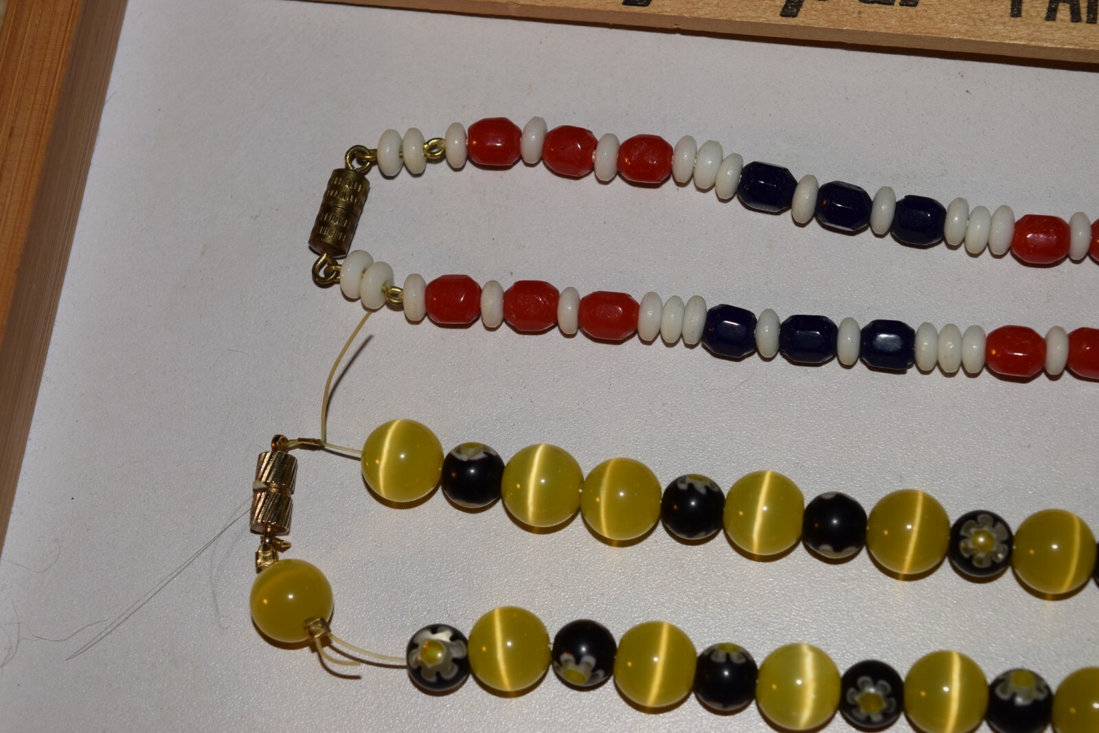 Vintage to now lot of 4 plastic beaded necklaces not sure what the 2 short ones
