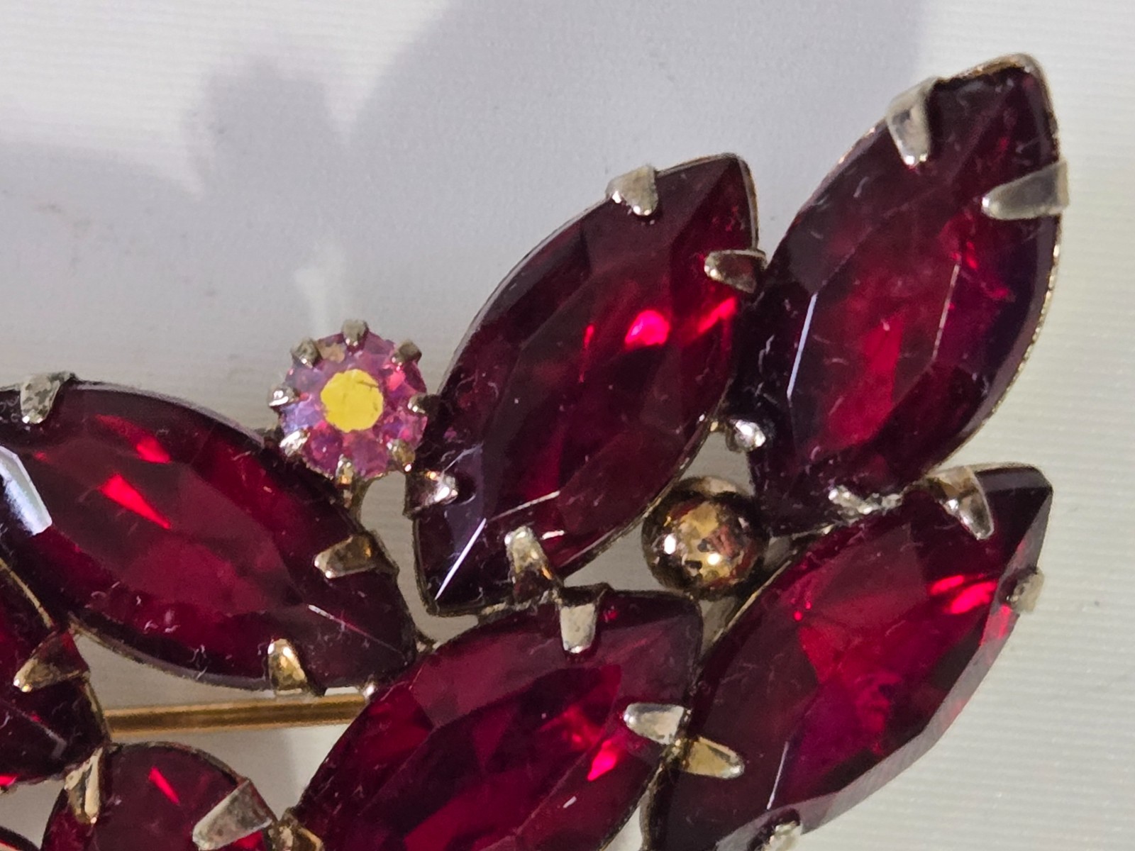 Vintage Brooch. Goldtone with Dark Red Stones. Pink Accent Stones. Gorgeous.
