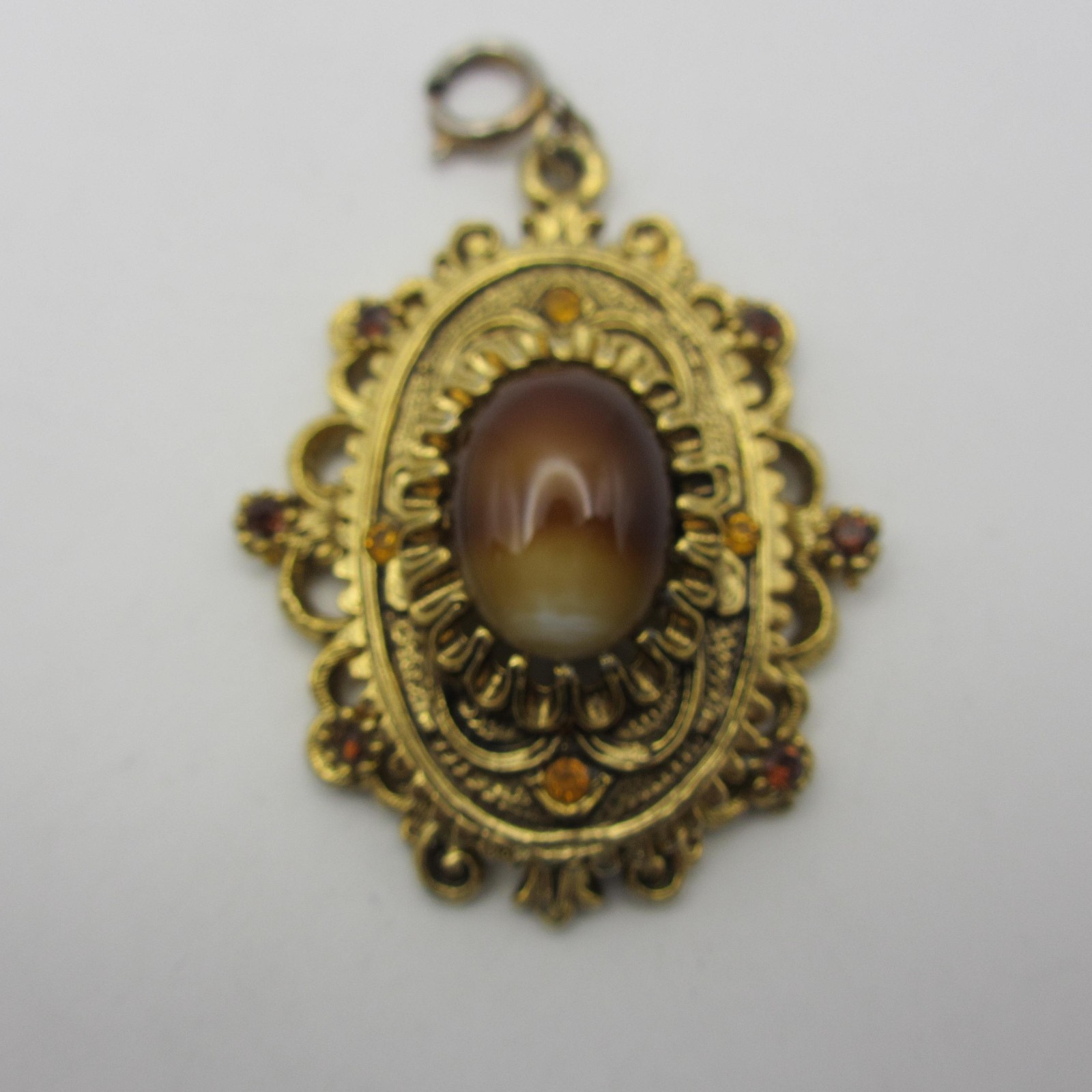 Vintage Celebrity Pendant Rhinestone Cabochon Ornate Textured Gold Tone