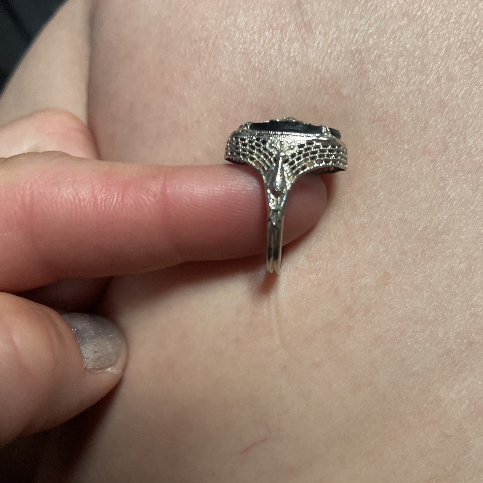 An authentic 14k white gold Art Deco onyx and diamond ring stamped “A&S”