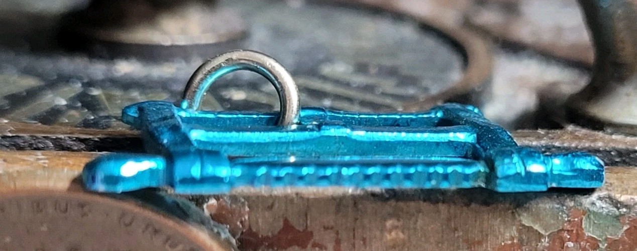 Vintage Blue Metal SAW charm prize jewelry