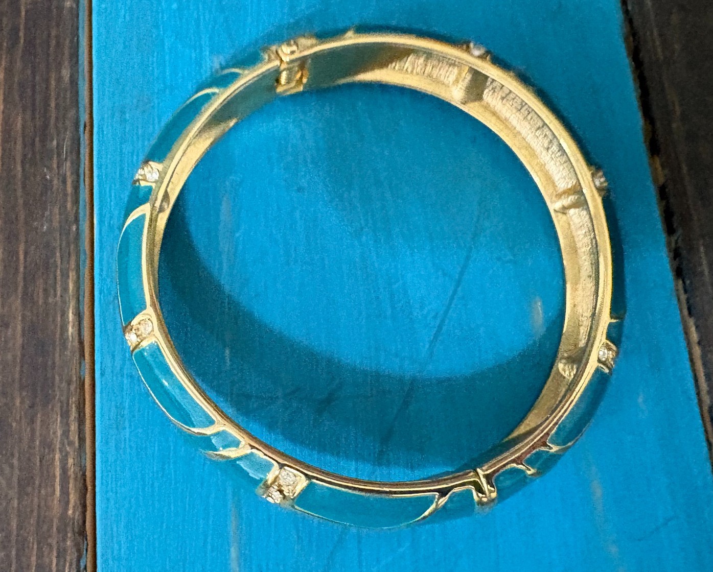 Vintage “Perfect Wave” azure blue enamel and crystal hinged bangle gold tone
