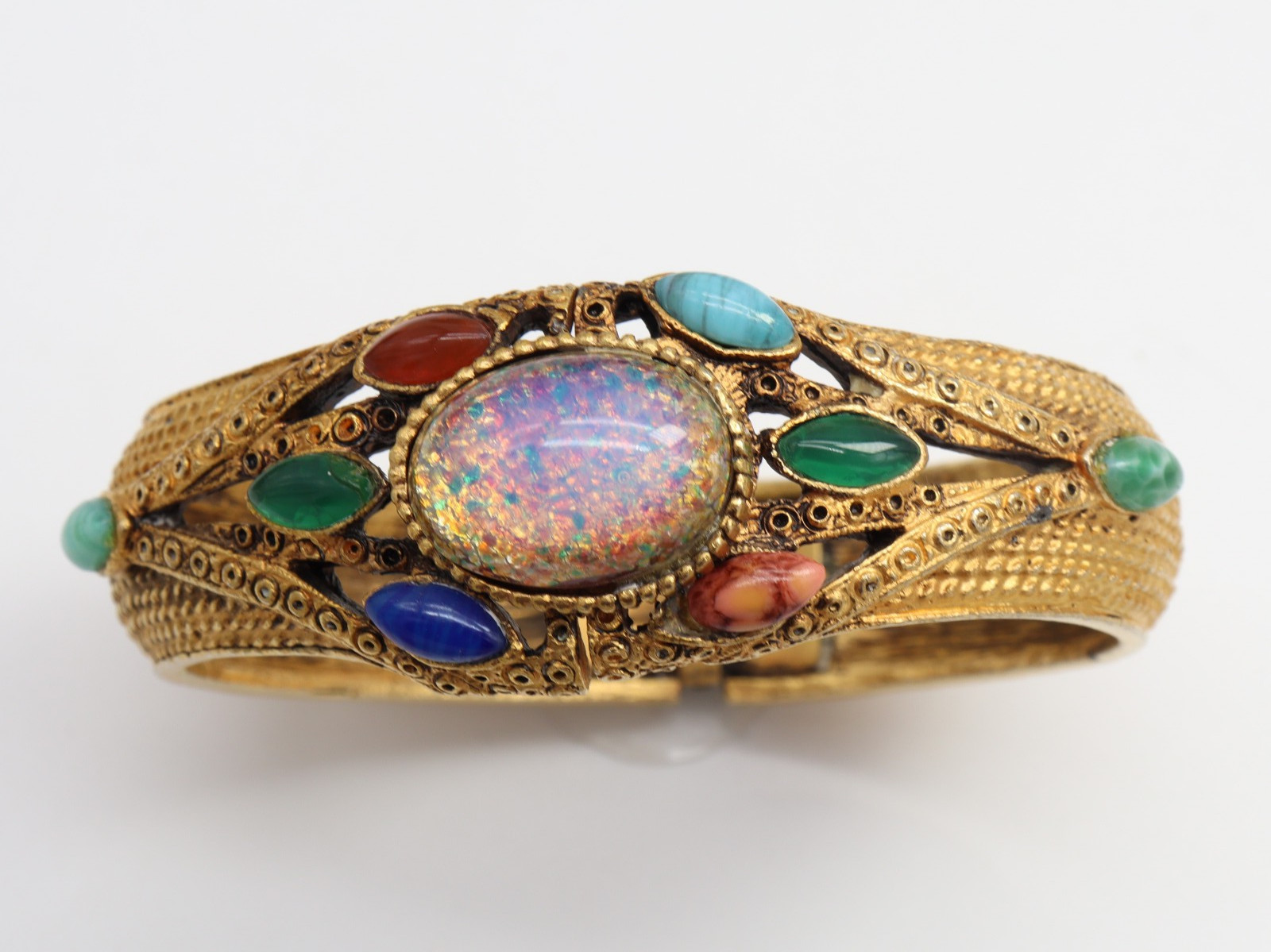 Vtg DESIRE Faux Opal Cabochon Clamper Bracelet Glass Gold Tone Hinged Pink Blue