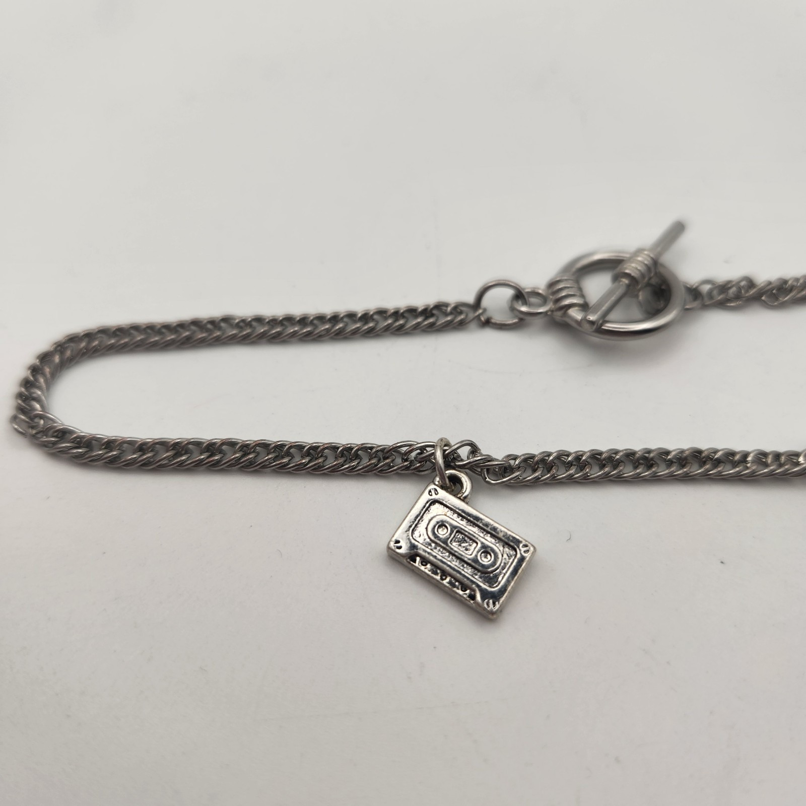 Vintage Silvertone Charm Bracelet Toggle Closure 8.5″ Retro Skate Cassette Tape