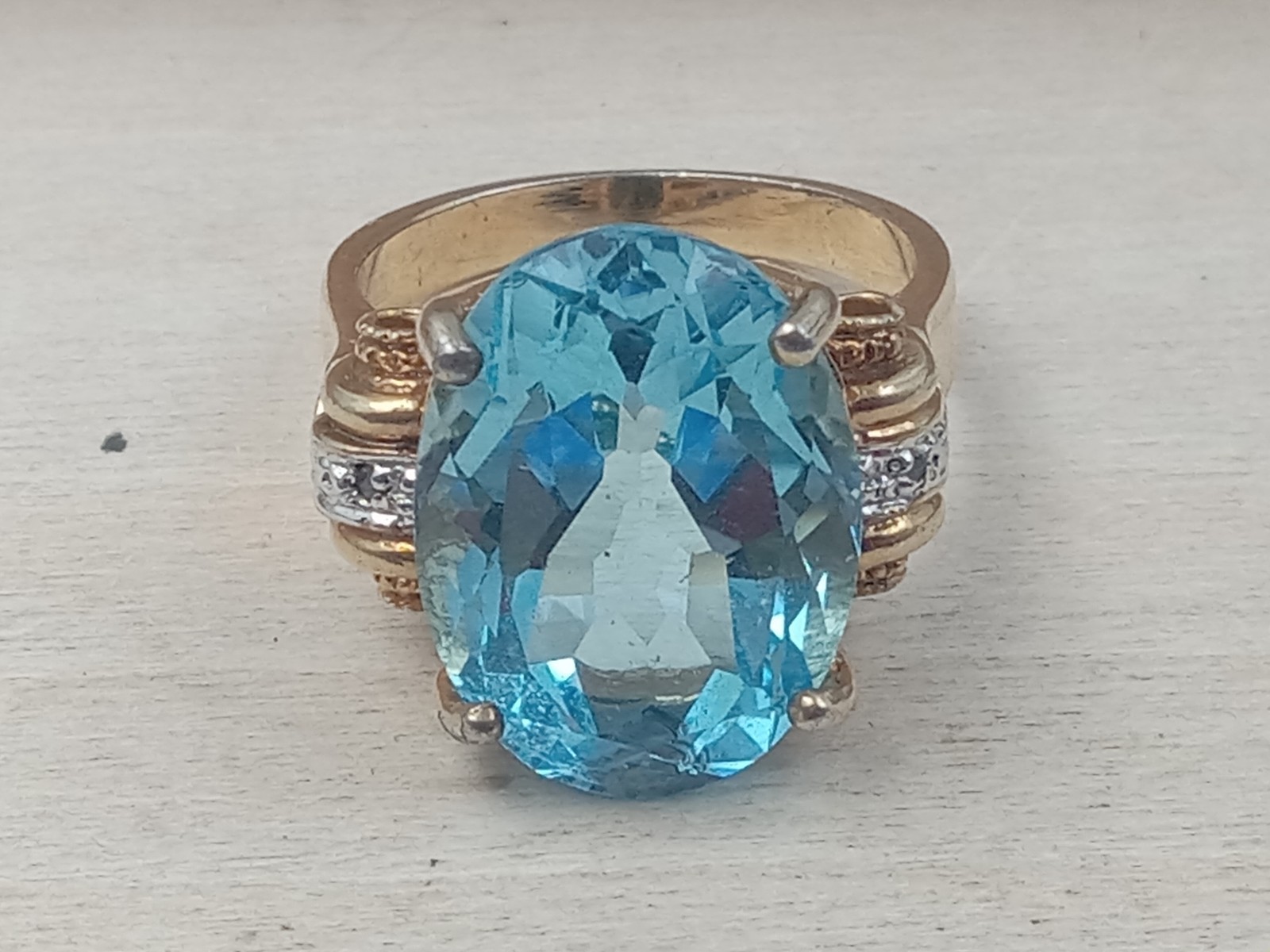 Deco style Sterling Ring Gold Wash – Faceted Blue Topaz Oval & Clear Accents: S8