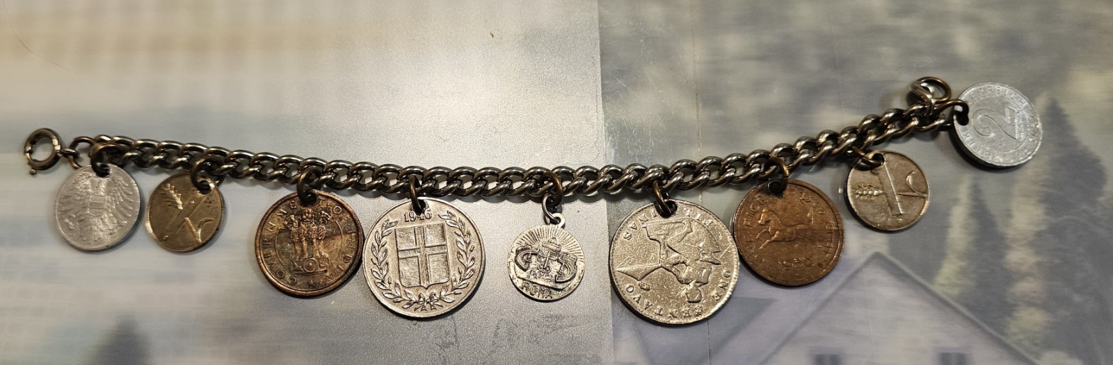 Vintage International Coin Charm Bracelet / About 8″ long / Circa 1950s / Unique