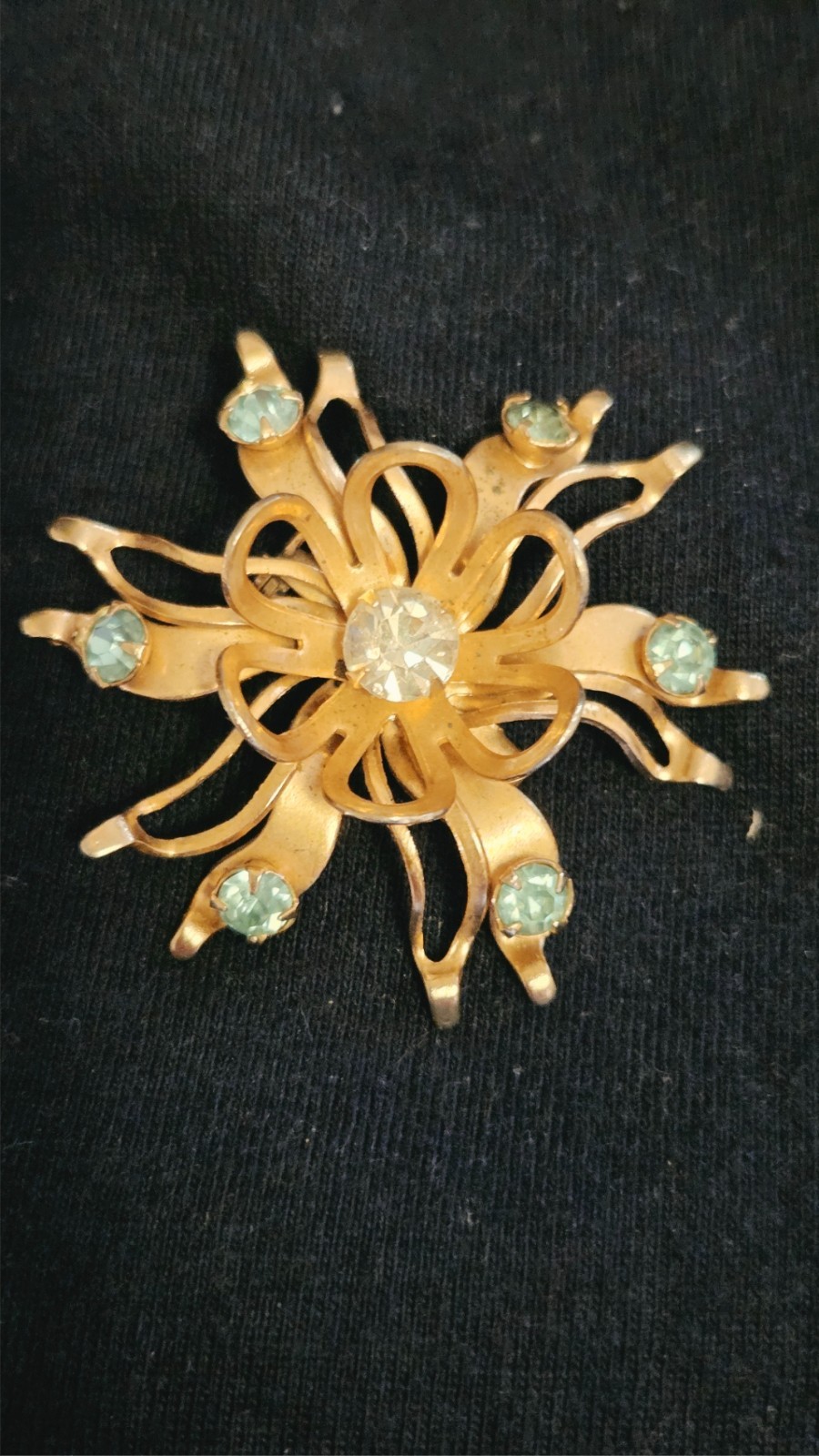 Mid‑Cent modern pin with floral design/ribbon petals /clear and aqua rhinestones