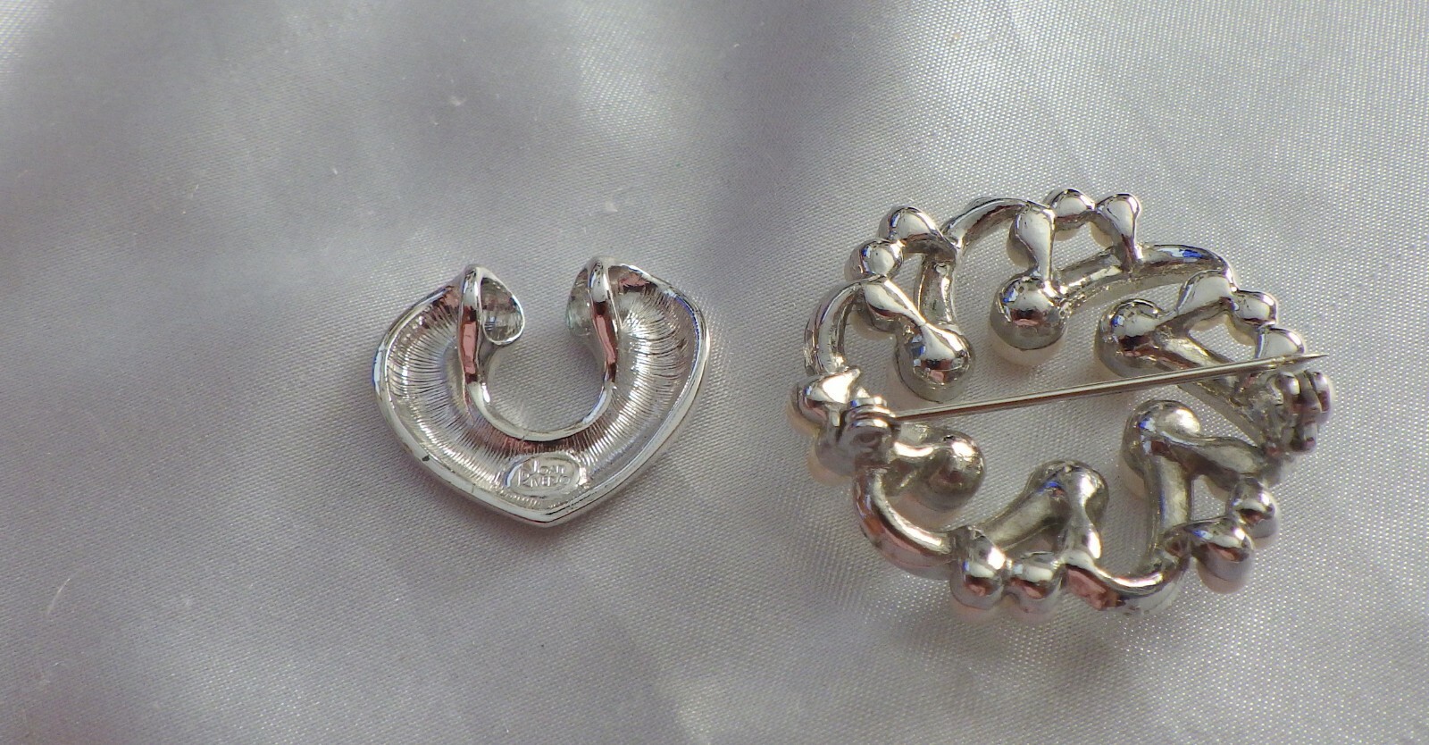TWO ITEMS FOR AUCTION, JOAN RIVER PENDANT SILVER TONE 1″ & PEARL BROOCH ON SILVE