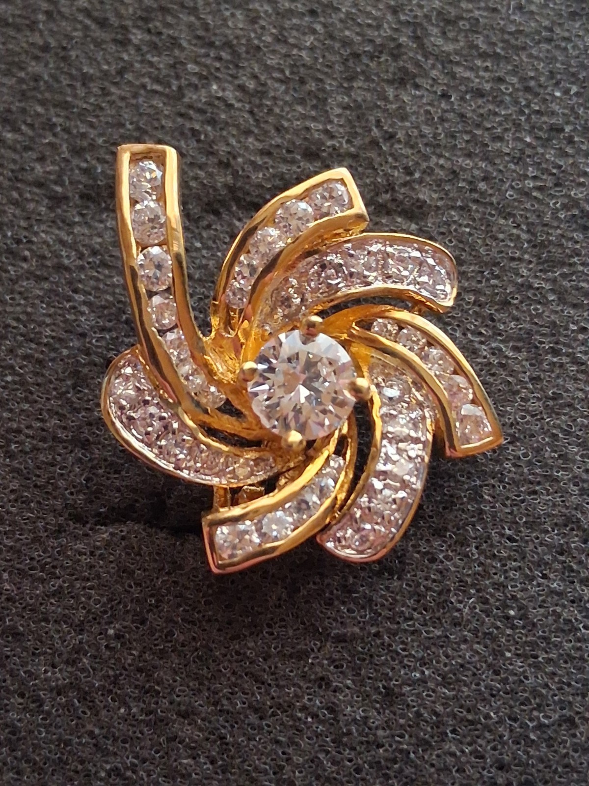 Pinwheel cubic zirconia embellished gold plated convertible brooch/pendant