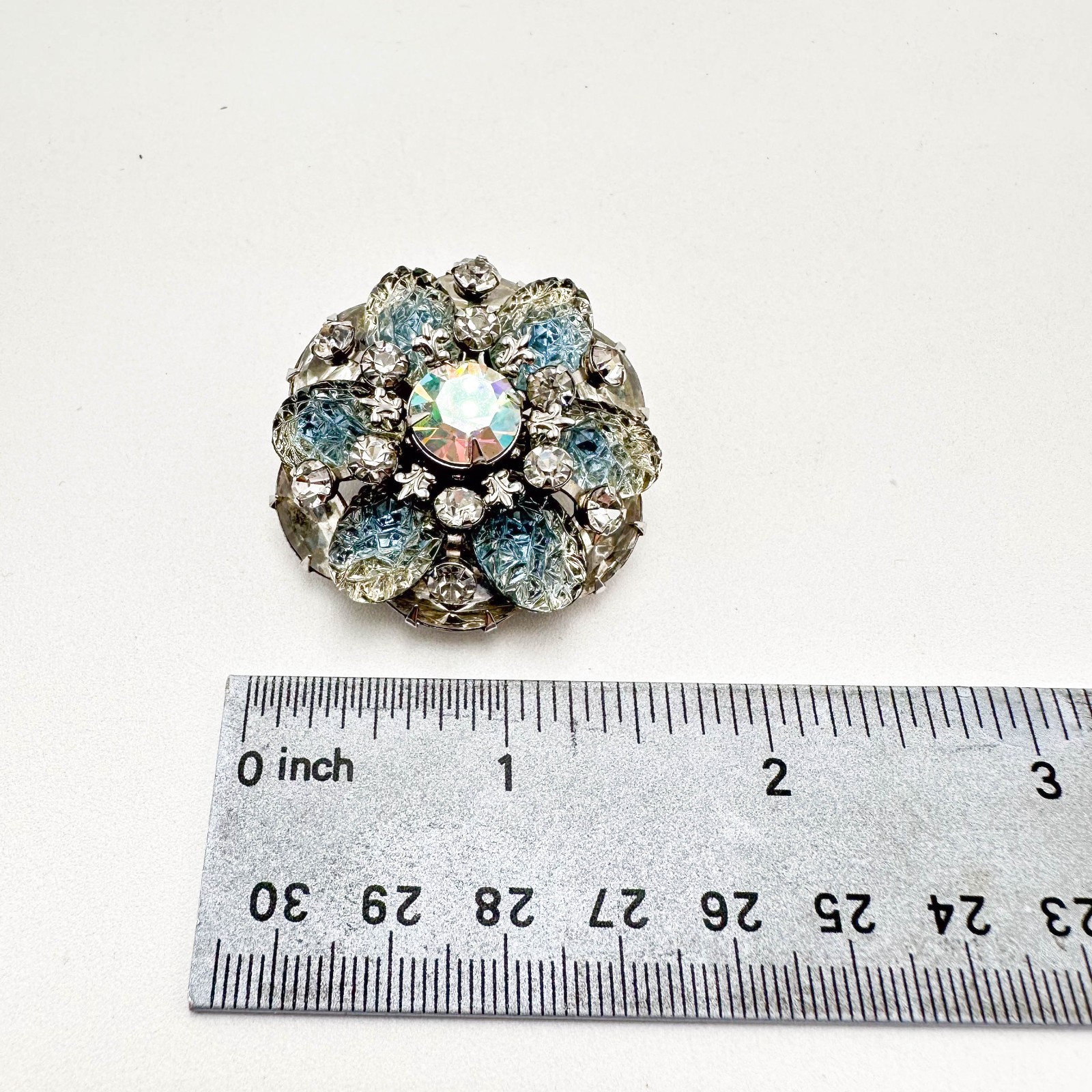 Vintage Brooch AB Icy Blue Molded Stones Silver Tone Tiered Rivet Unsigned 1.5″D