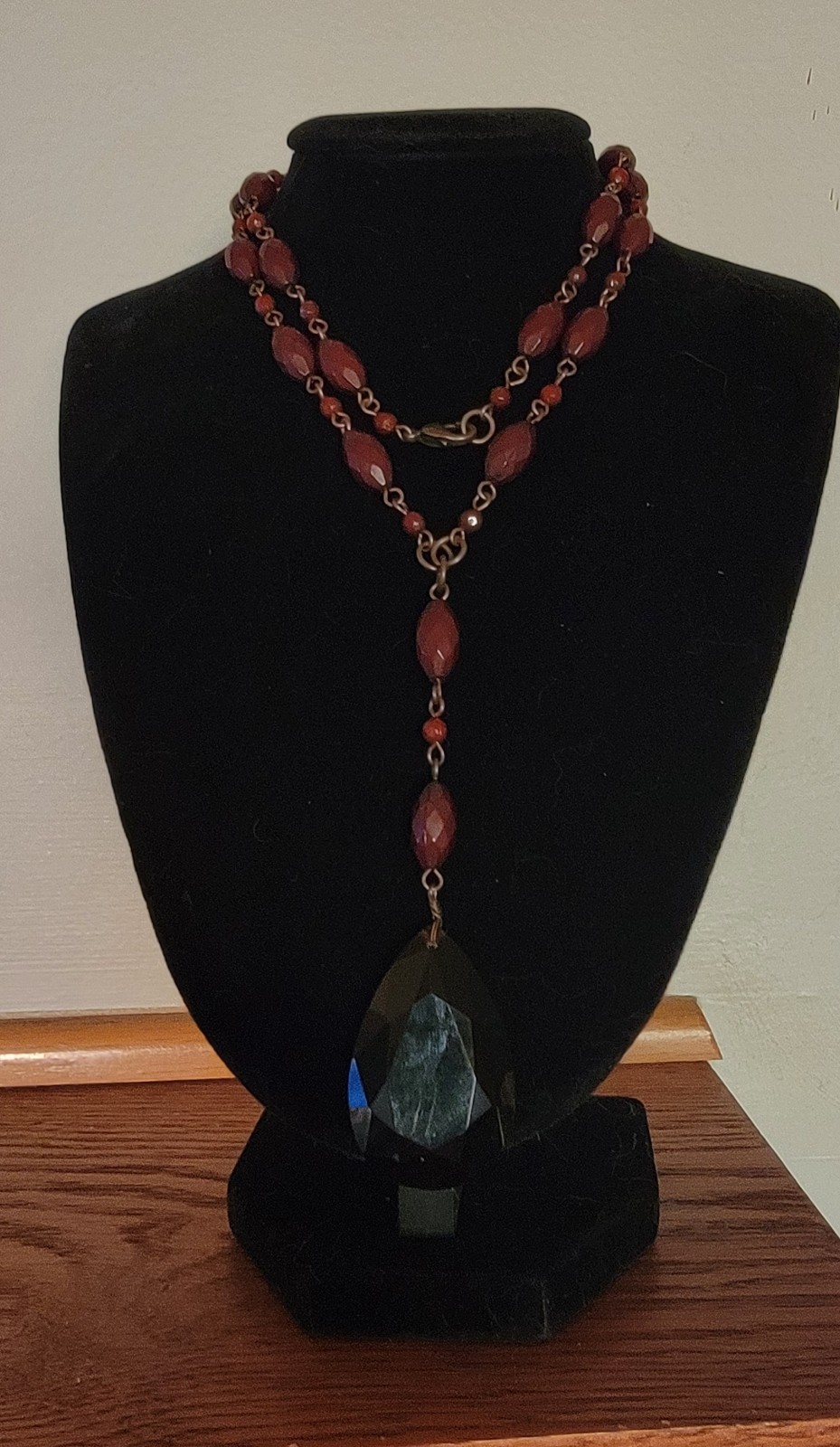 Faceted teardrop pendant necklace crafted with a distinctive vintage aesthetic