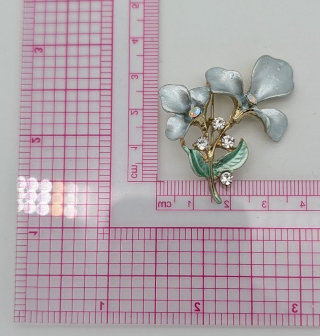 vintage blue enamel flower clear rhinestones green enamel leaves brooch pin