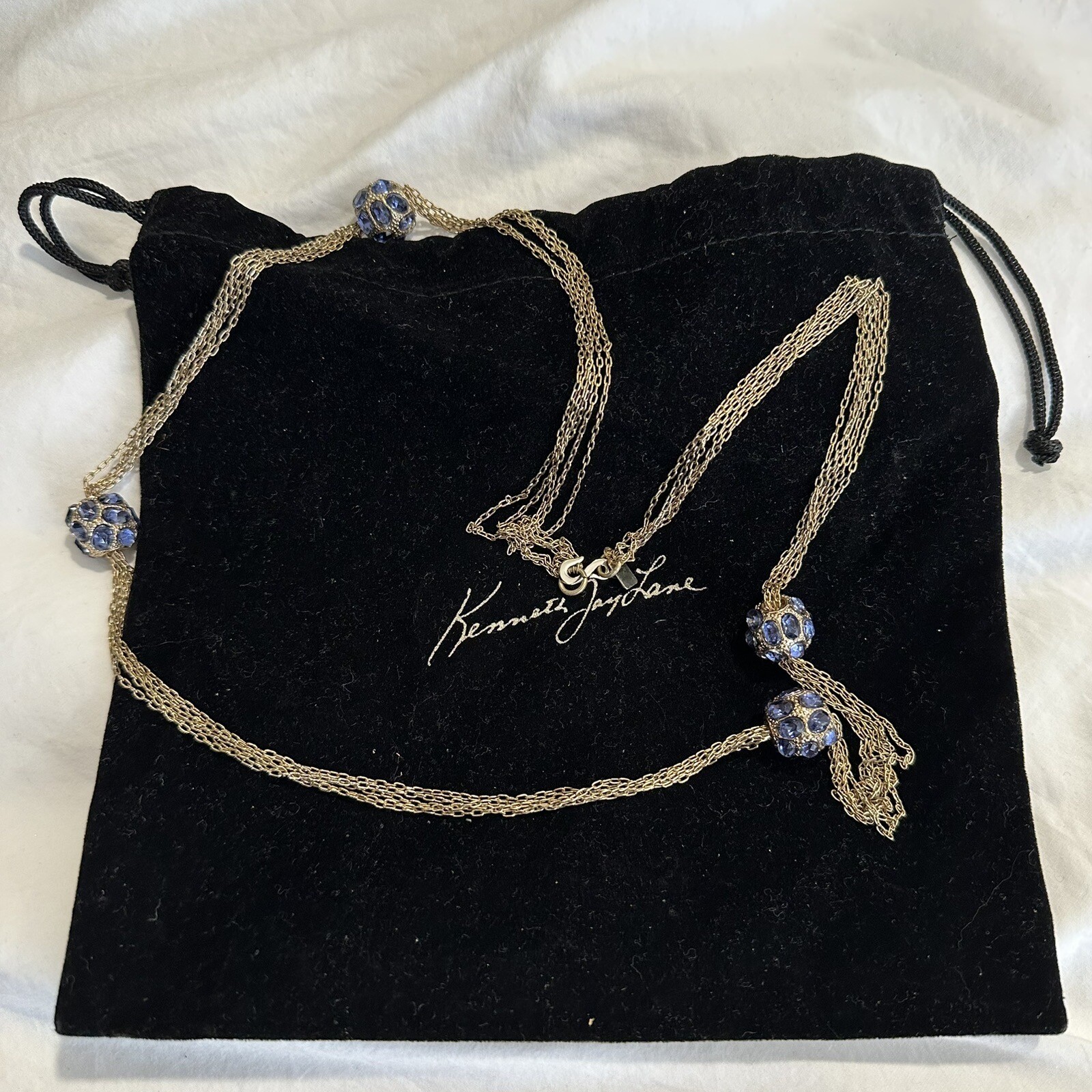 KENNETH JAY LANE SIGNED NECKLACE WITH BLUE CRYSTALS and POUCH