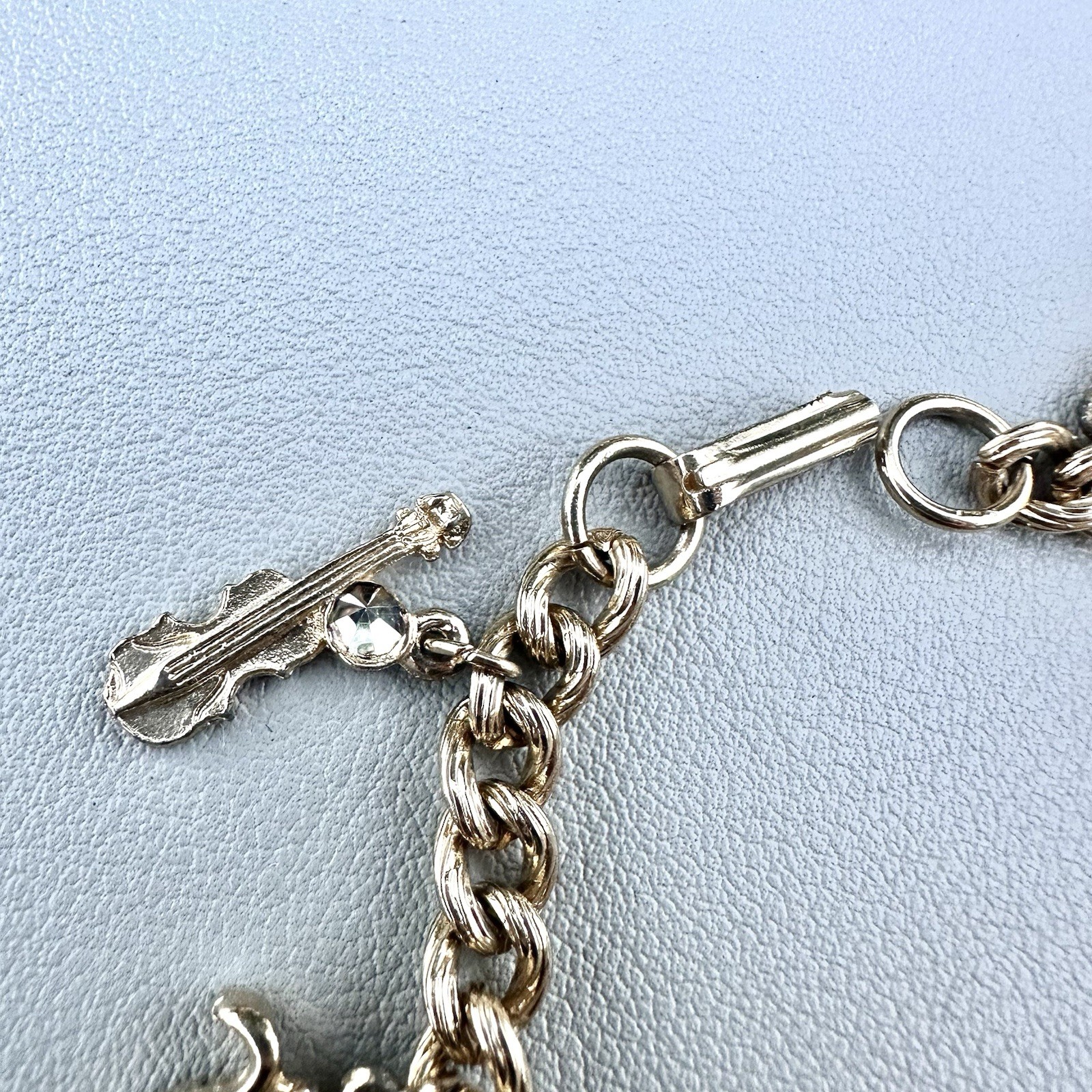 Vintage Musical Instruments Charm Bracelet Gold Tone Rhinestone Notes Chain