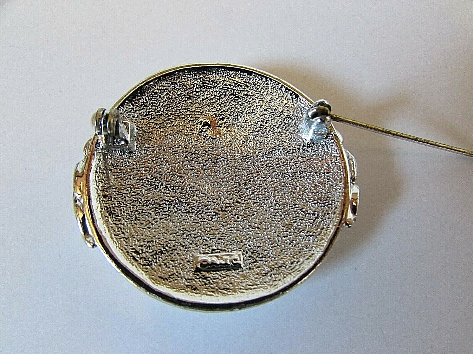 Vintage AJC Signed Silver Tone Holding Hands Across the World Brooch Pin 1 1/2″