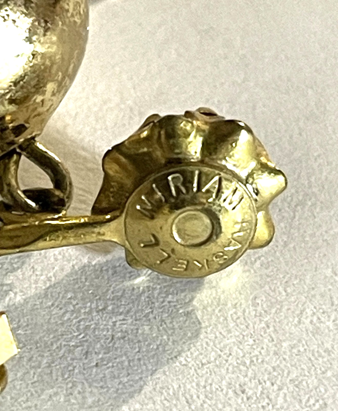 Vintage MIRIAM HASKELL Signed Gold tone Adjustable Clip-on Dangle Earrings.