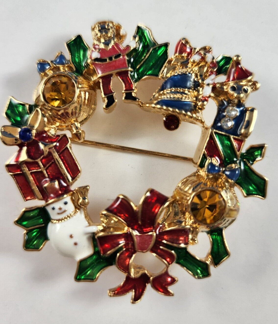 AVON Brooch Pin Christmas Collectible Holiday Wreath Rhinestones Santa Bell 2010