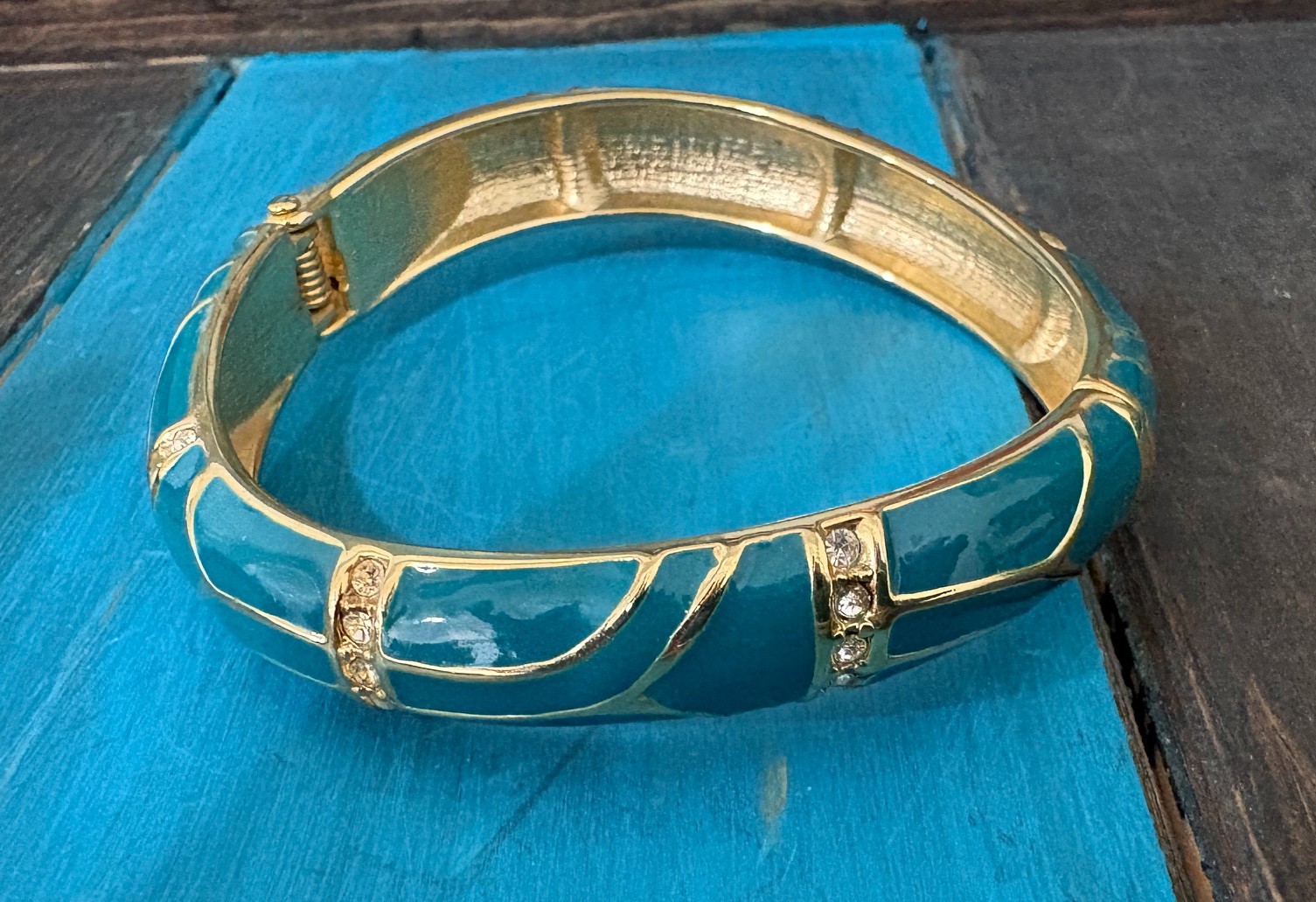 Vintage “Perfect Wave” azure blue enamel and crystal hinged bangle gold tone