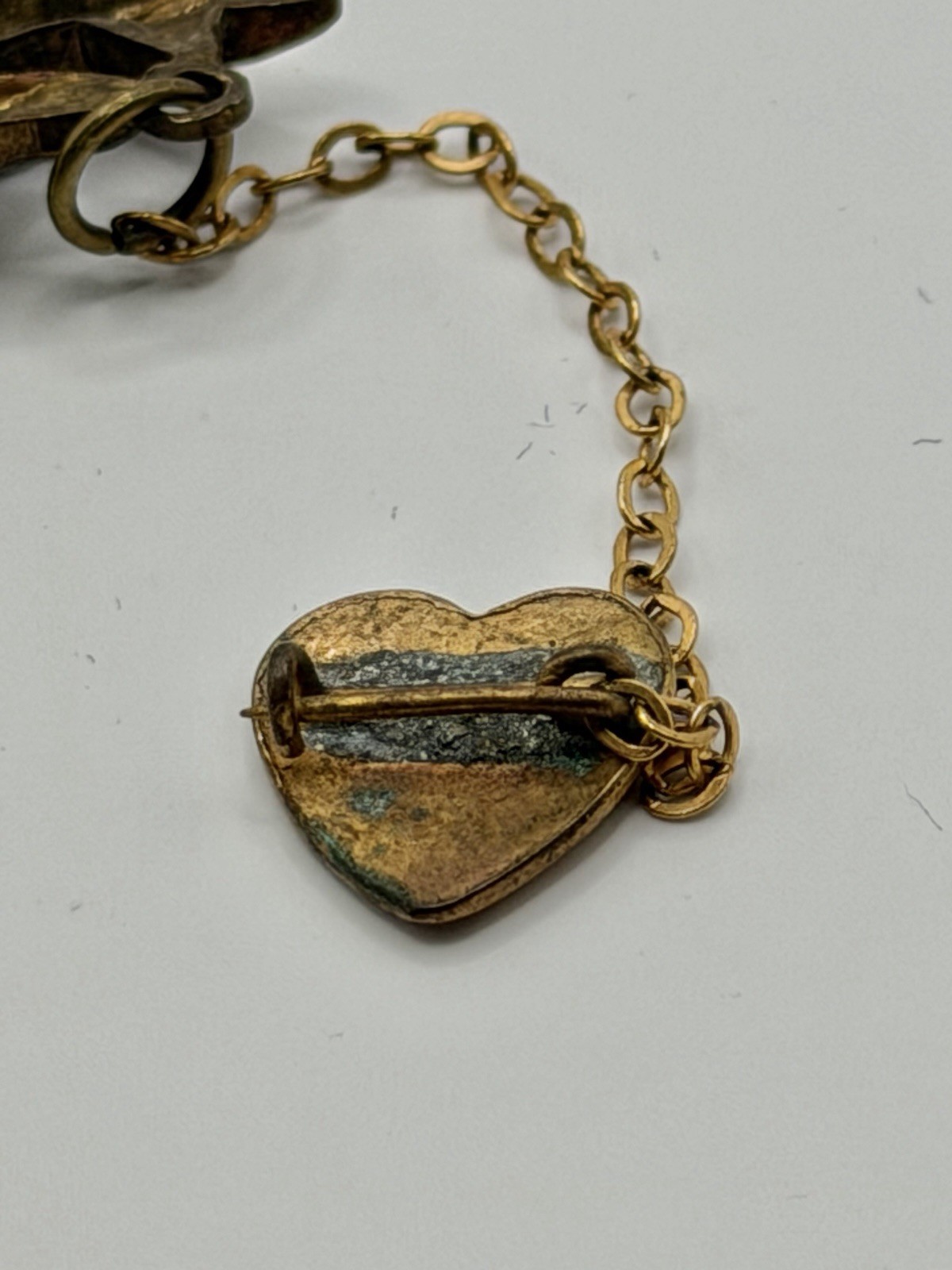 Antique Victorian Brass Hand Holding a Dangling Engraved Mini Heart Pin Brooch