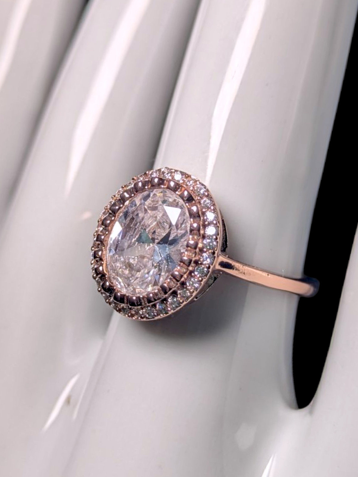 Vintage Inspired Simulated Diamond Solitaire with Simulated Diamond Halo with As