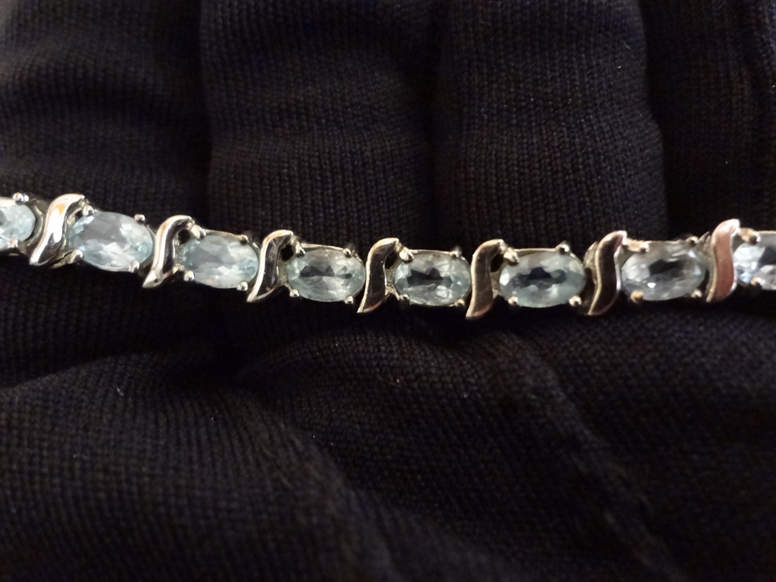 #48-DBJ-925 STERLING SILVER BRACELET LOADED WITH BEAUTIFUL STONES