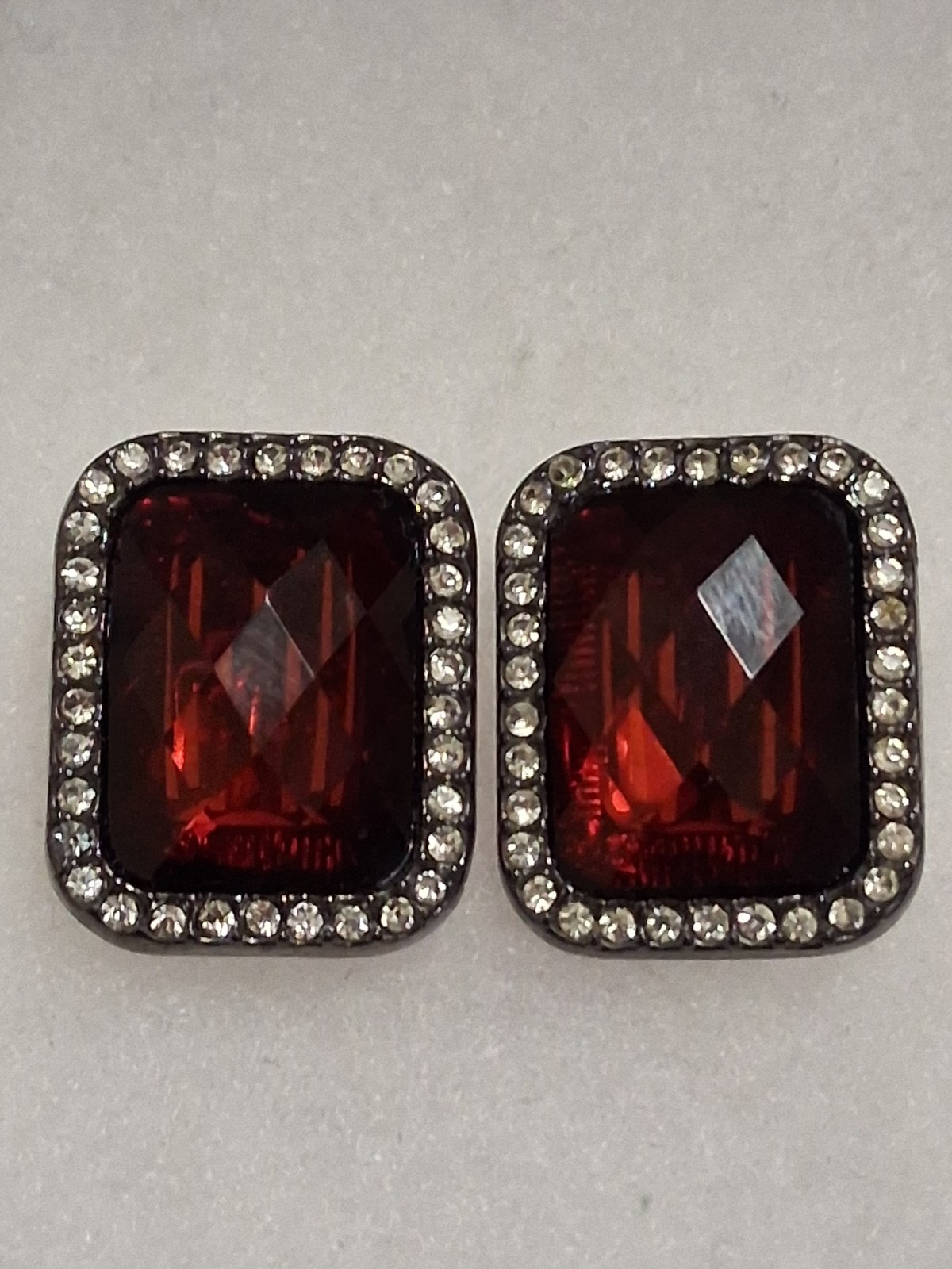 Red faceted acrylic rectangle clip on halo earrings, clear rhinestone border