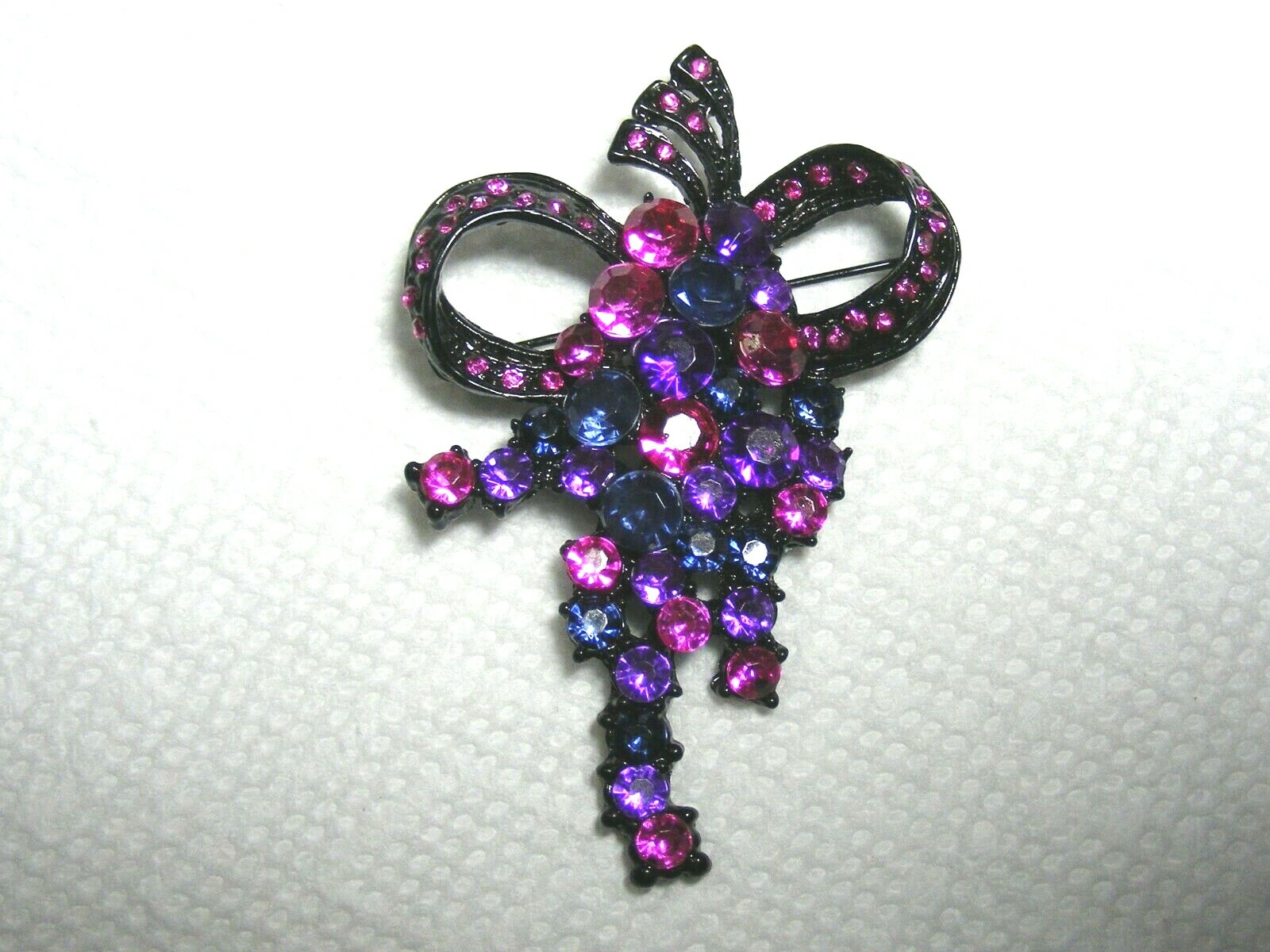 Vtg. Black Metal Pink, Purple And Blue Rhinestone Brooch