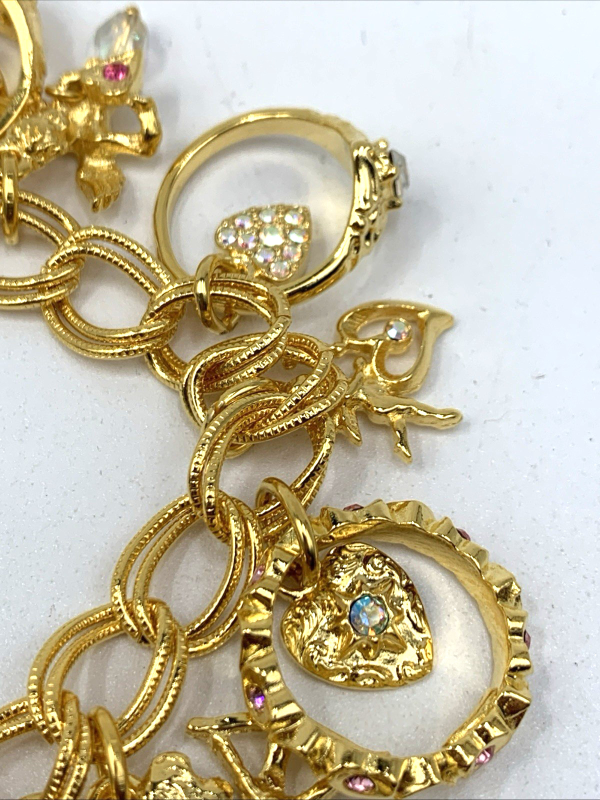 Kirks Folly Gold Tone Charm Bracelet Cupid Hearts Rings Crystals Angel