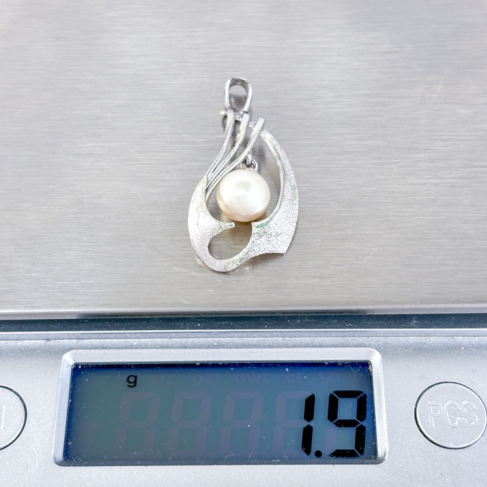 Vintage Silver-Tone Modernist Pendant with Pearl Accent