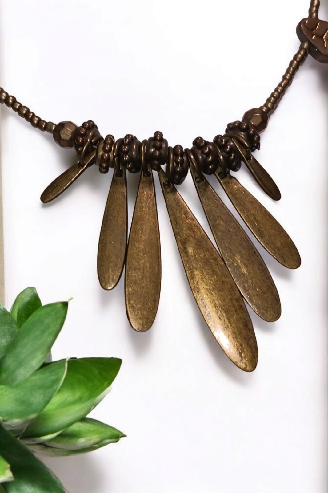 Brass Toggle Closure Necklace With Leaves On It