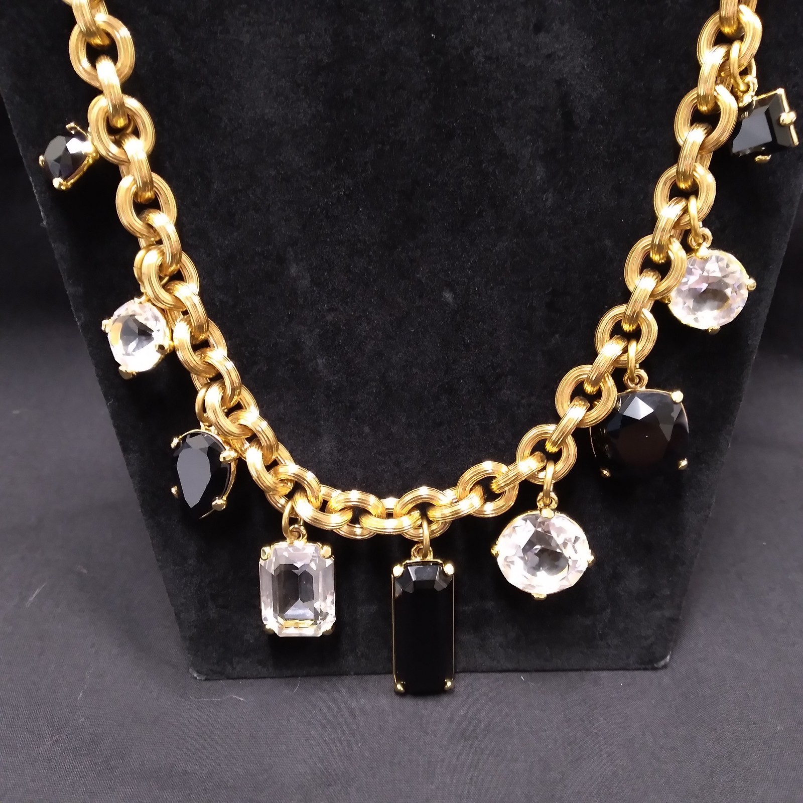 Monet Gold Tone Chunky Necklace with Clear and Black Crystal Charms