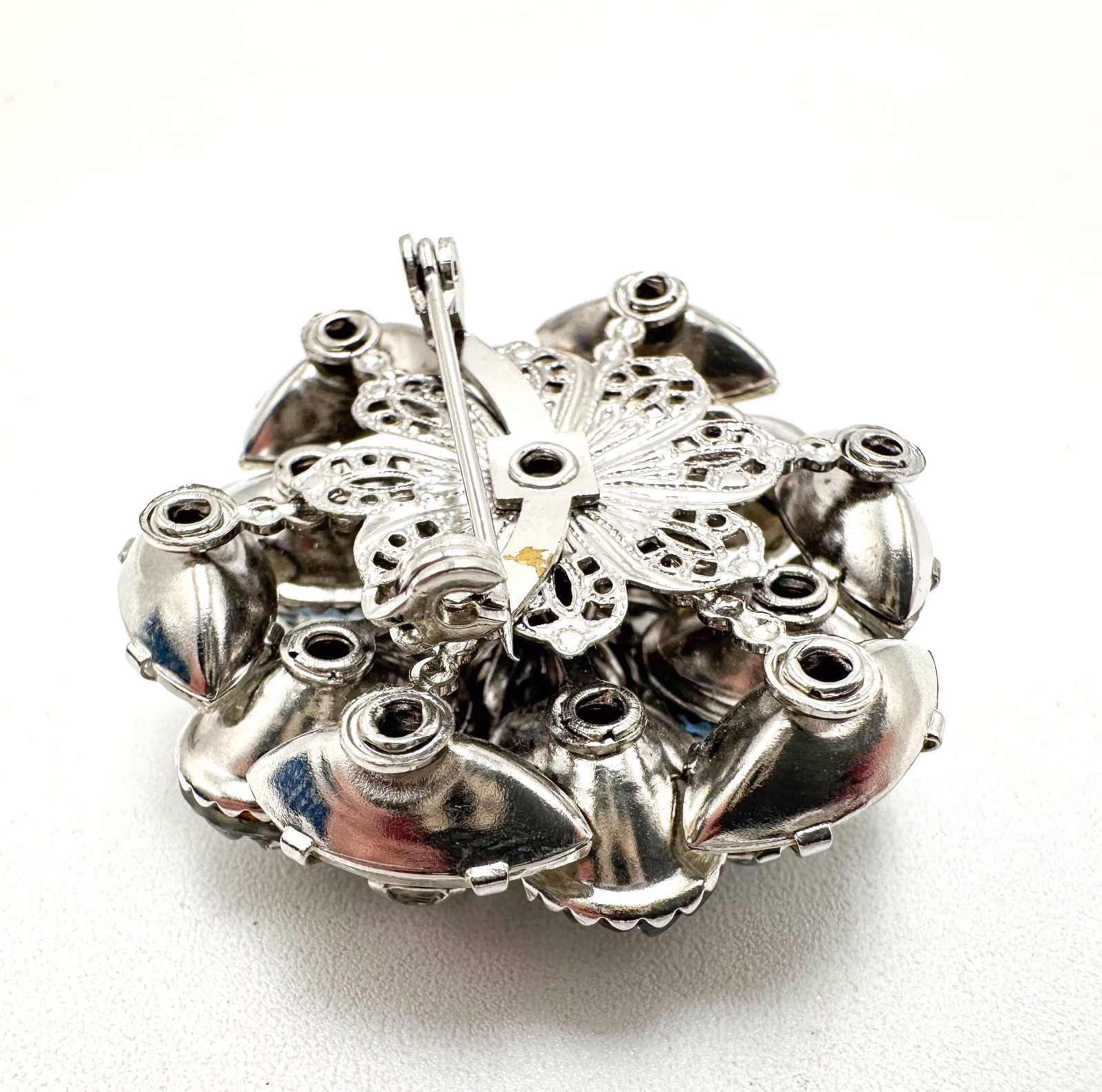 Vintage Brooch AB Icy Blue Molded Stones Silver Tone Tiered Rivet Unsigned 1.5″D