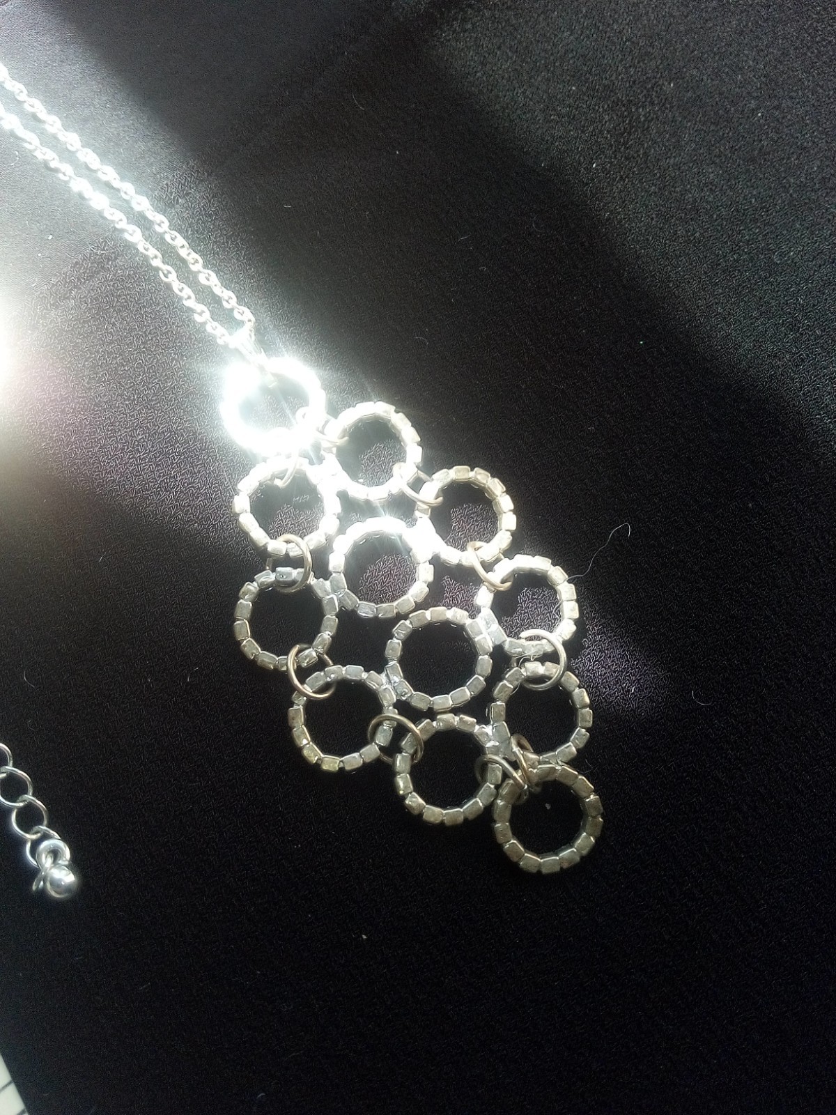 Neckl: 25, 2-1/2″ Pendant of Rhinestone Circles, ST, 17″ Chain, Lobster Clasp