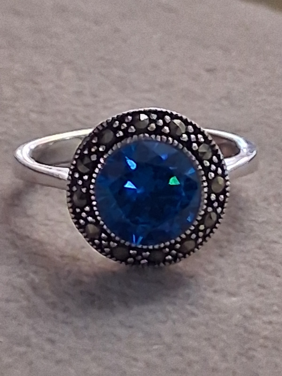 Blue faceted & marcasite halo ring, silverplated, round setting, SZ 6.75