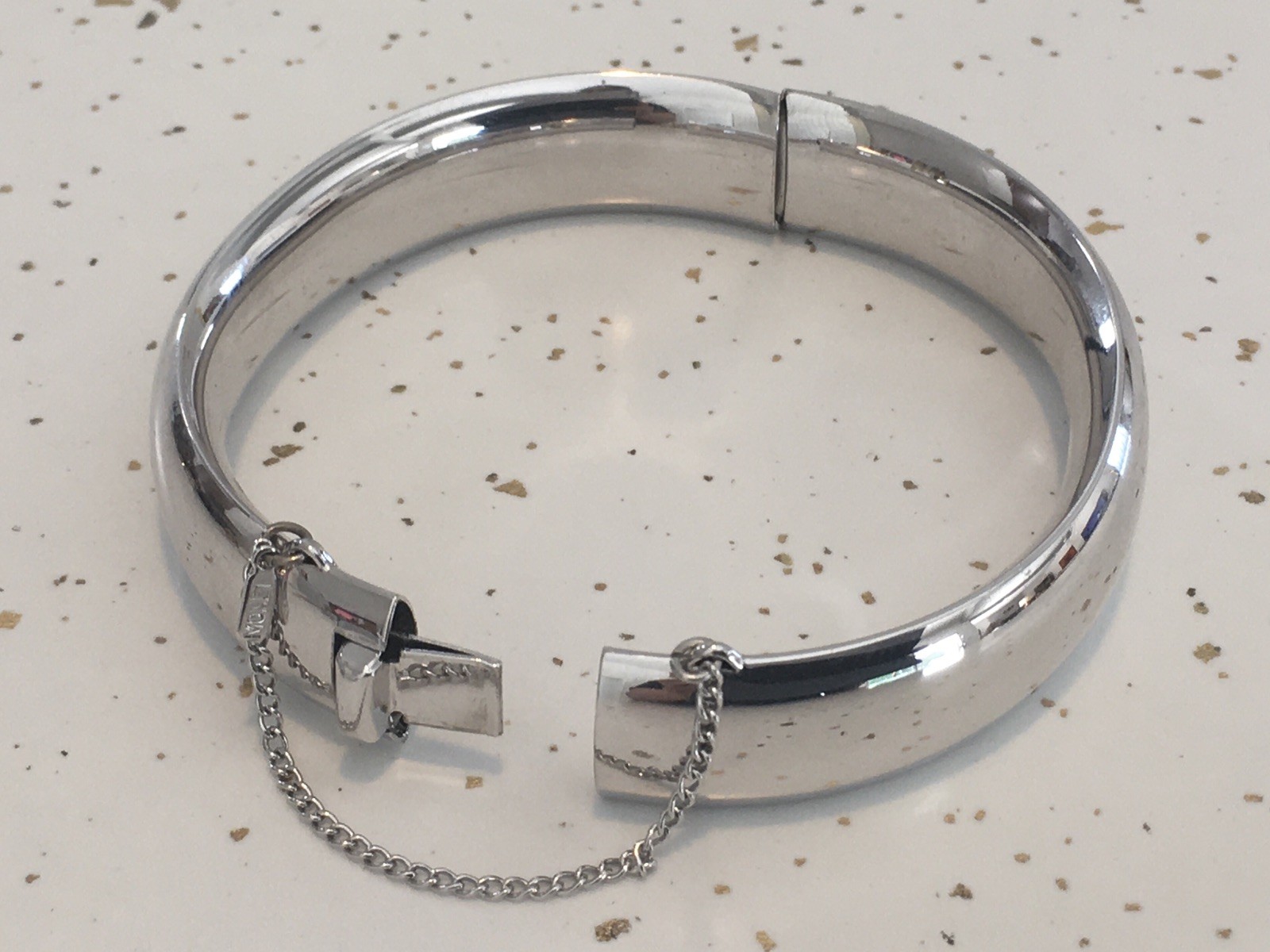 VTG MONET Sleek Silver-Tone MODERN Clasp Hinged BANGLE BRACELET w/ Safety Chain