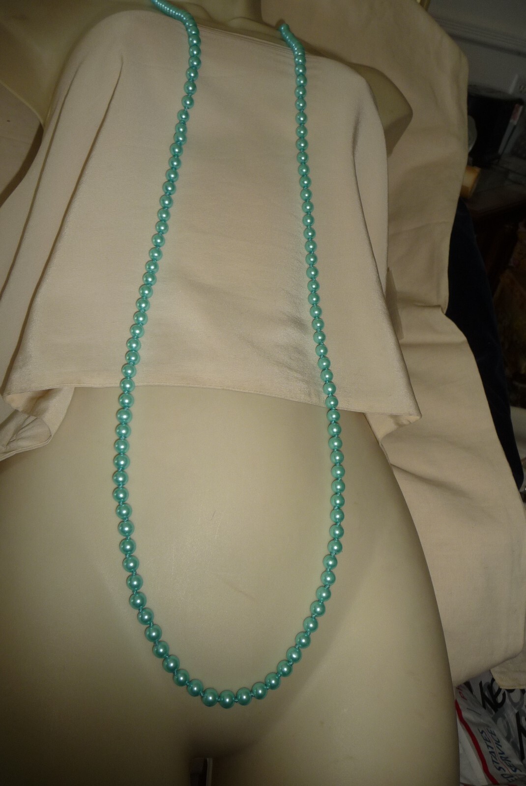 #1721A NECKLACE 28″L NO CLASP HAND KNOTTED AQUA BLUE FAUX PEARL BEADS