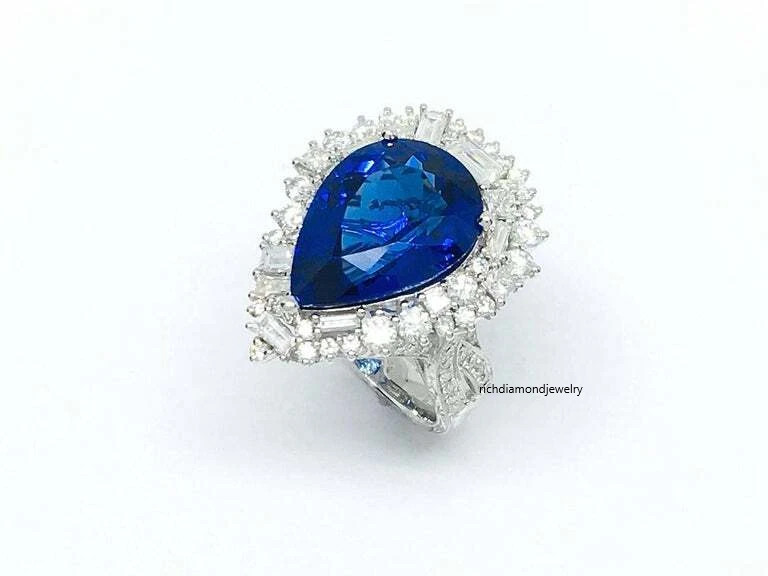 Beautiful Pear Shape 13.24CT Tanzanite & Different Shapes 3CT Shiny CZ Halo Ring