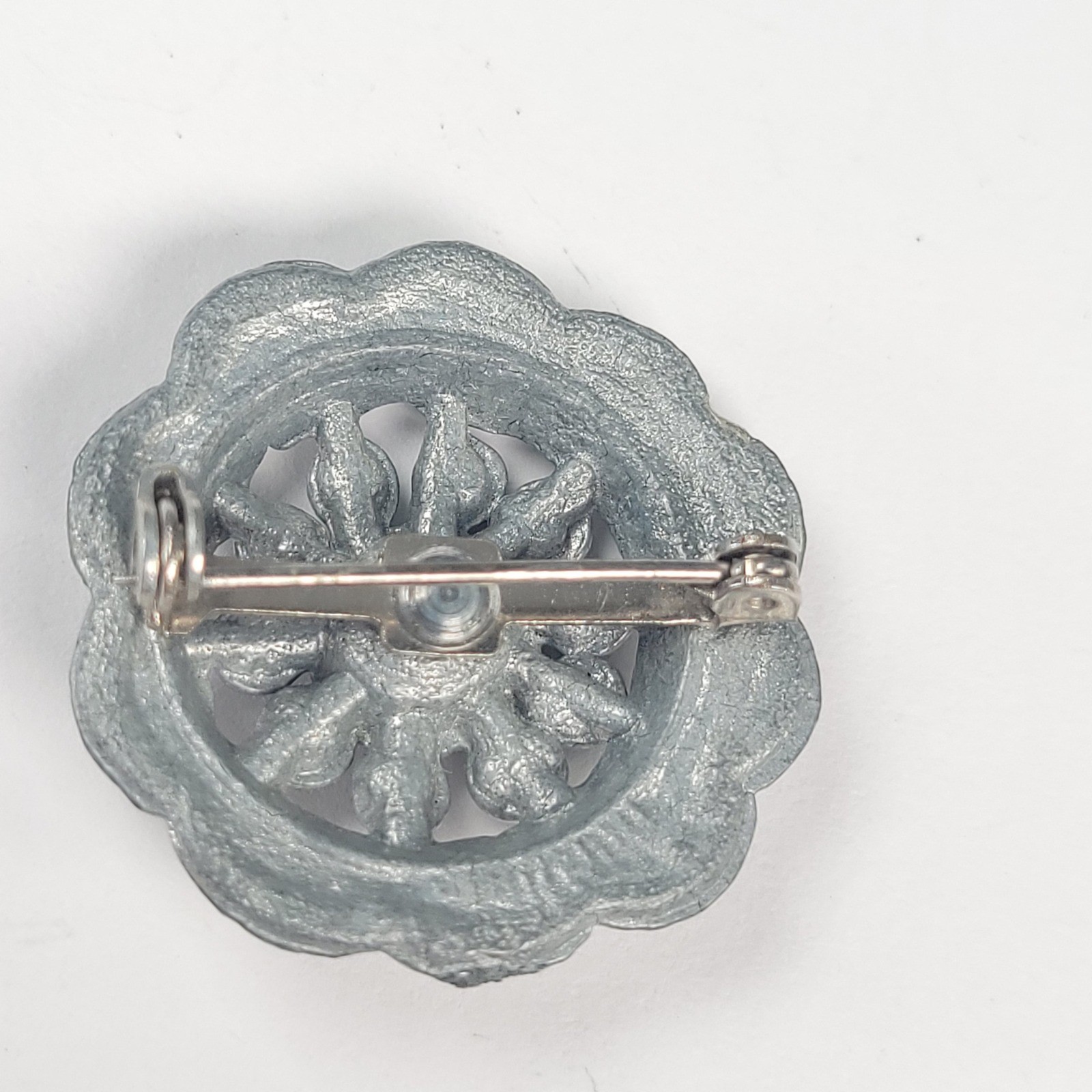 Vintage Small Rhinestone Pot Metal Brooch Silver Tone Floral Rosette Pin GG1