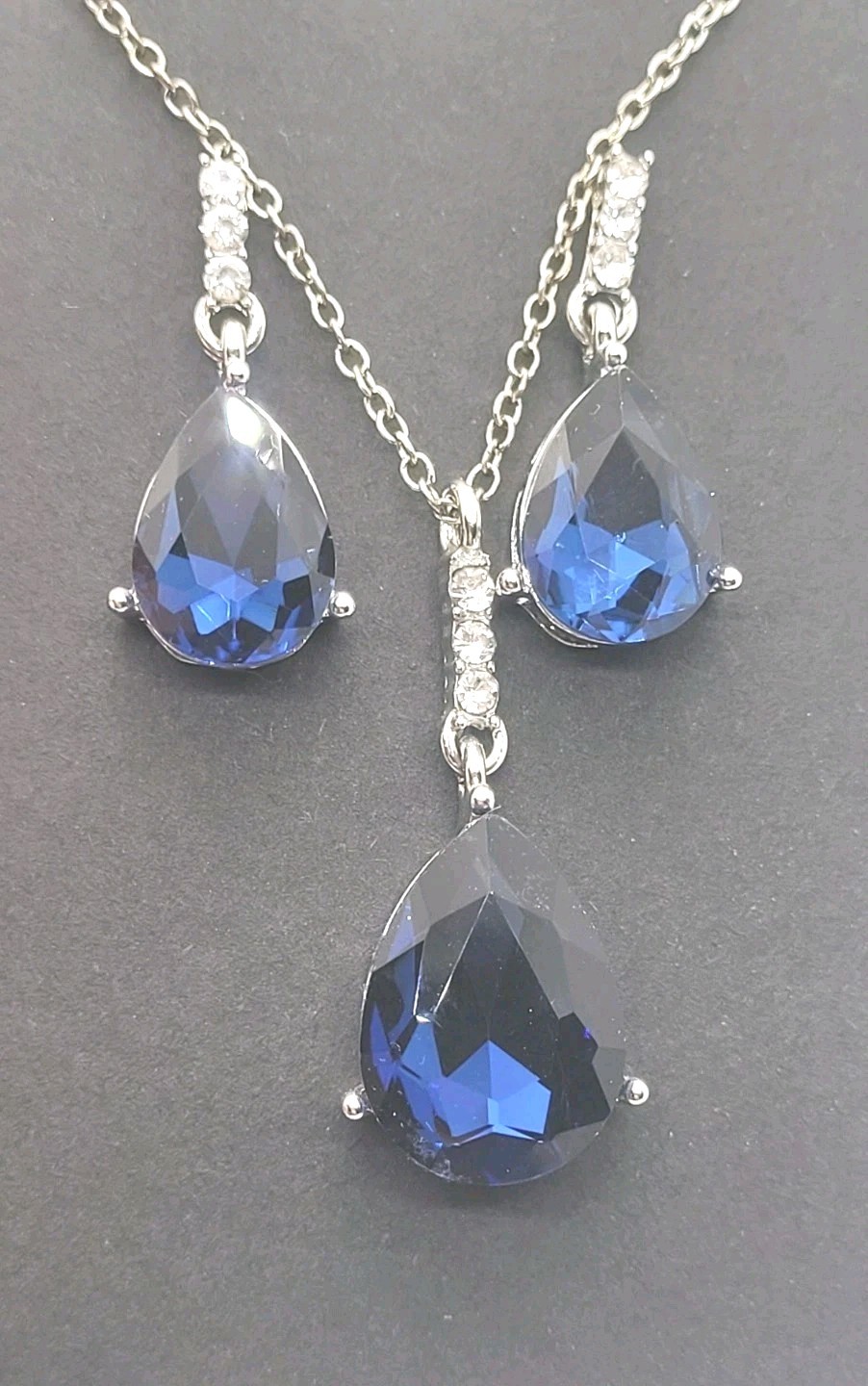 Silver Tone Blue Crystal Chain Rhinestone Necklace 18in And Dangling Earrings.