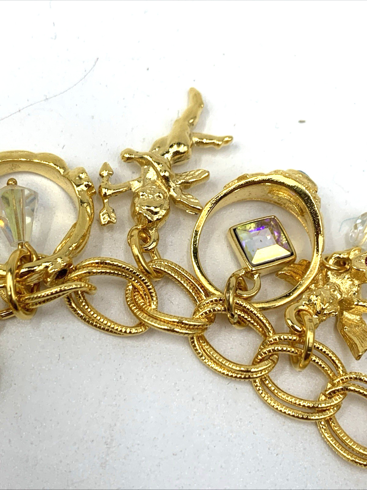 Kirks Folly Gold Tone Charm Bracelet Cupid Hearts Rings Crystals Angel