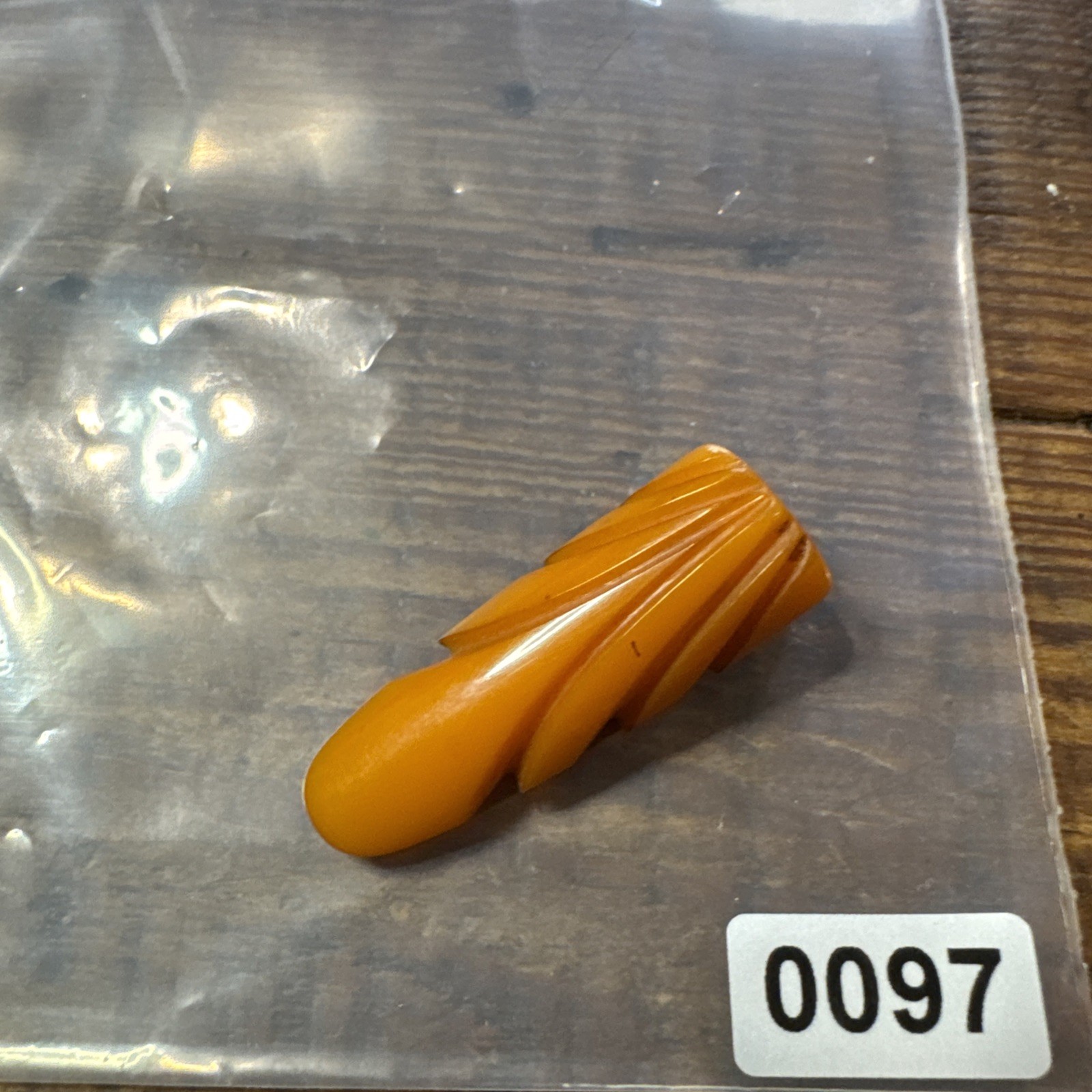VINTAGE CARVED BAKELITE Dress Clip Butterscotch