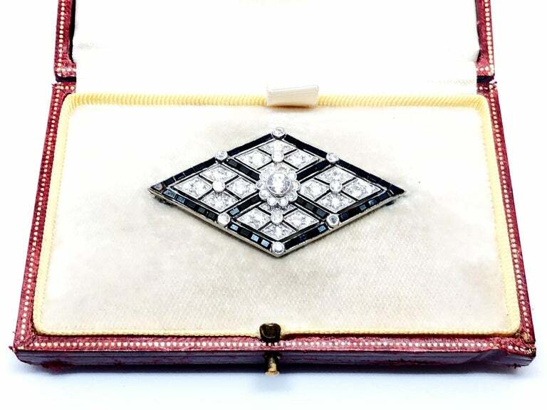 Lozenge Shape With Round Cut Cubic Zirconia & Calibre Cut Onyx Border Brooch