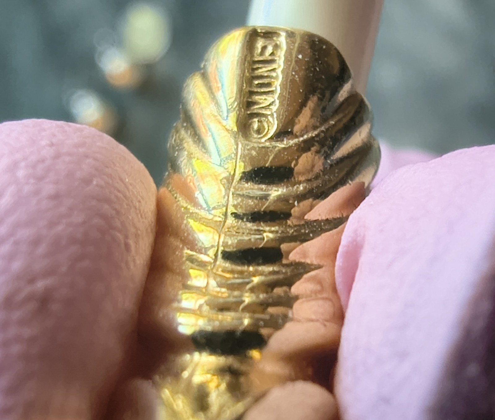 Signed Monet vintage bracelet with a bright gold-tone finish.