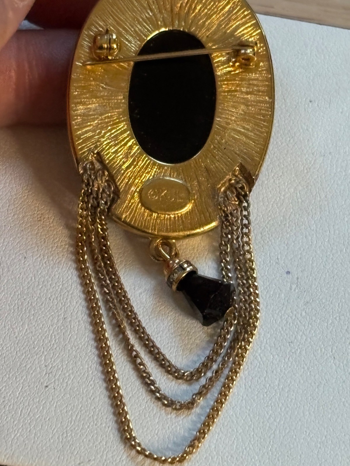 KJL signed Gold Tone Brooch With Black Stone & Crystal Accents