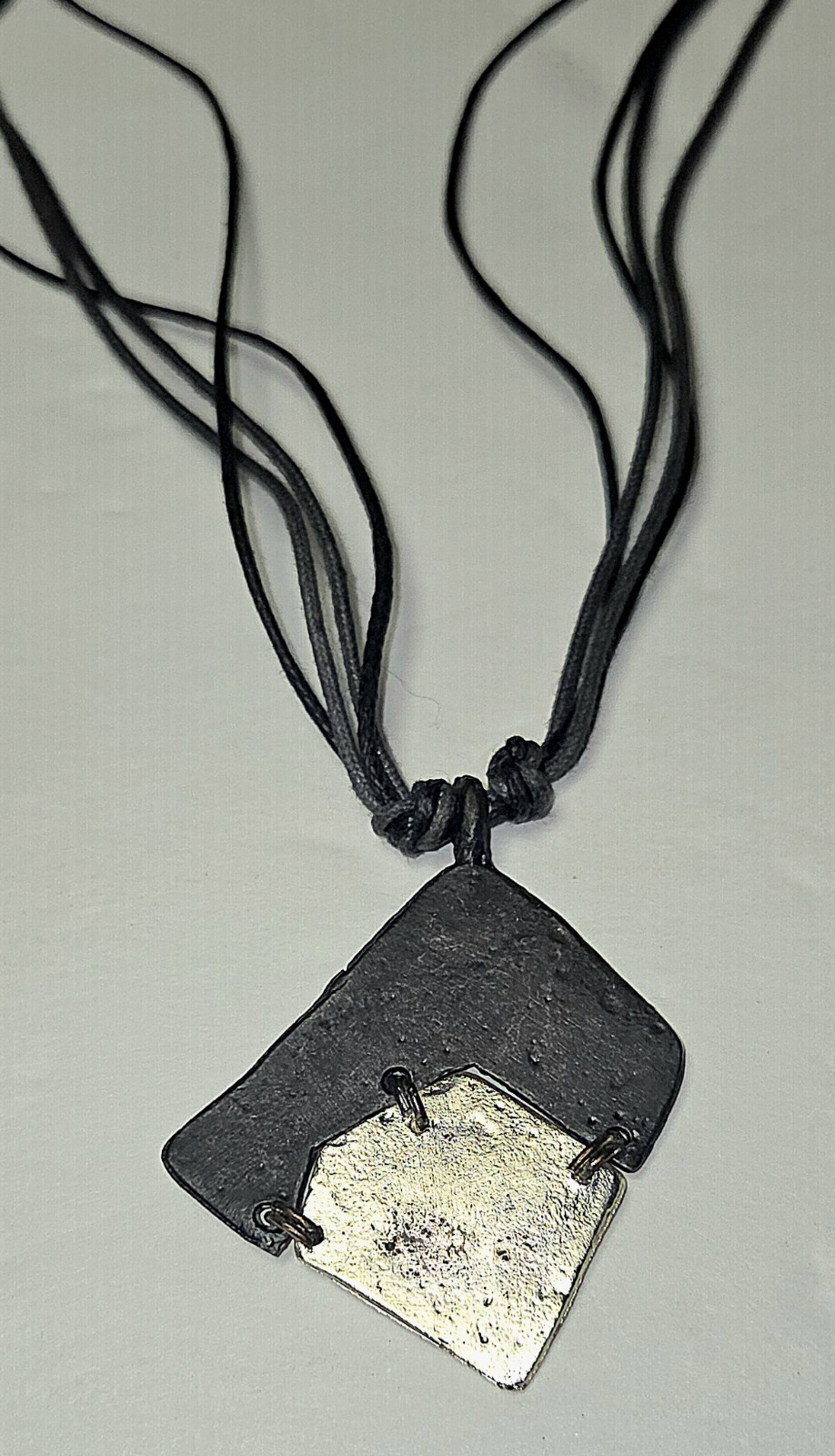 Vintage Handmade Organic Metal Abstract Pendent On Black Layered Cord