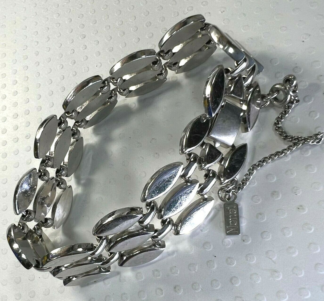 Vintage MONET 5/8″ x 7 1/4″ SILVER TONE heavy bracelet with safety chain