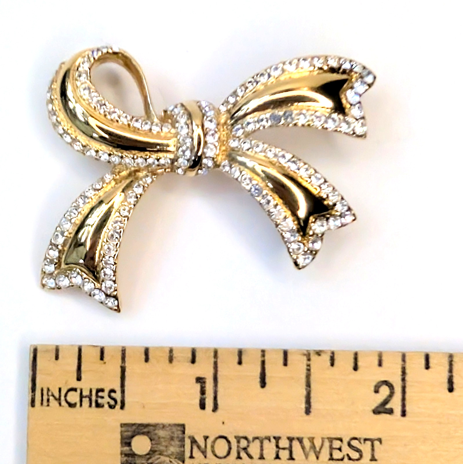 Vintage Monet Bow Brooch Gold-tone Plated Pave Clear Crystals 1980s–1990s
